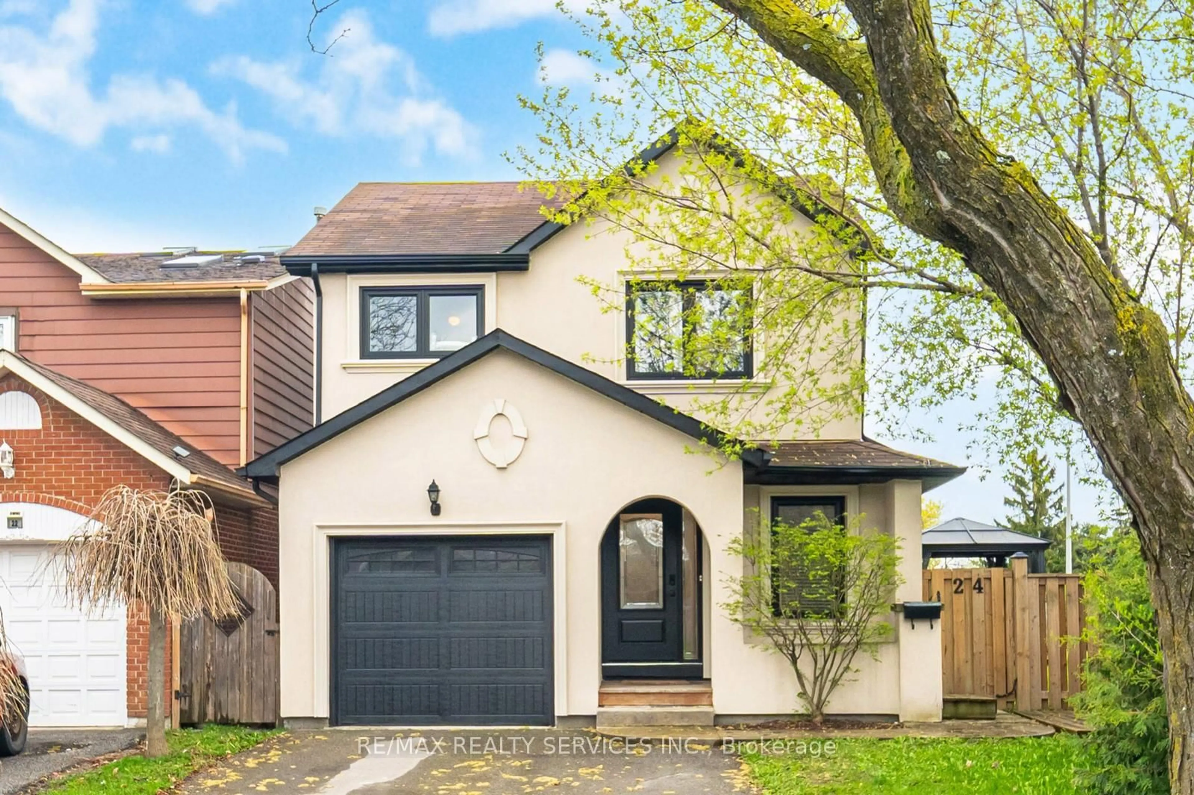 Home with brick exterior material, street for 24 Foxacre Row, Brampton Ontario L6V 3P5