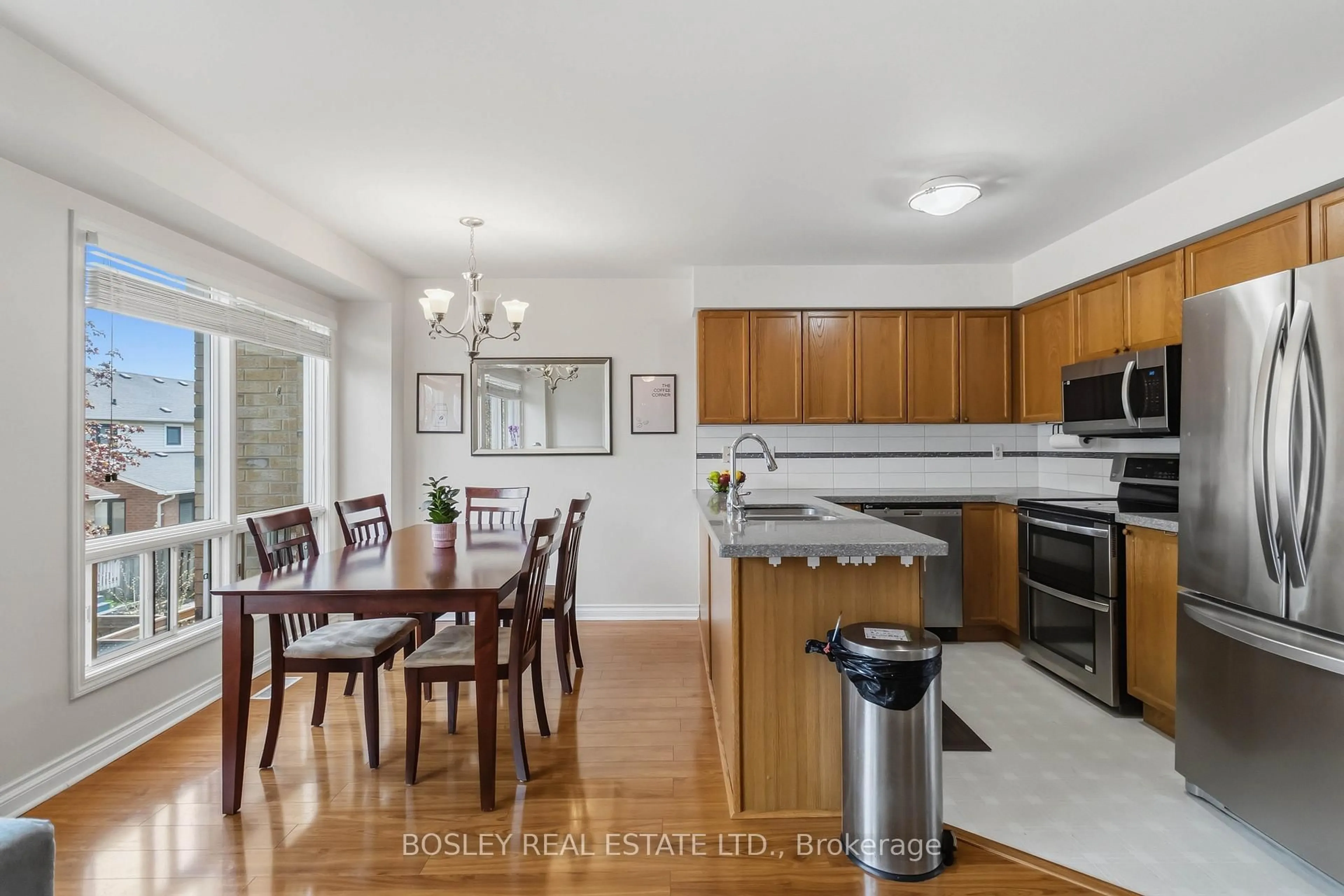 Open concept kitchen, wood/laminate floor for 2223 Prescott Pl, Burlington Ontario L7L 6L3