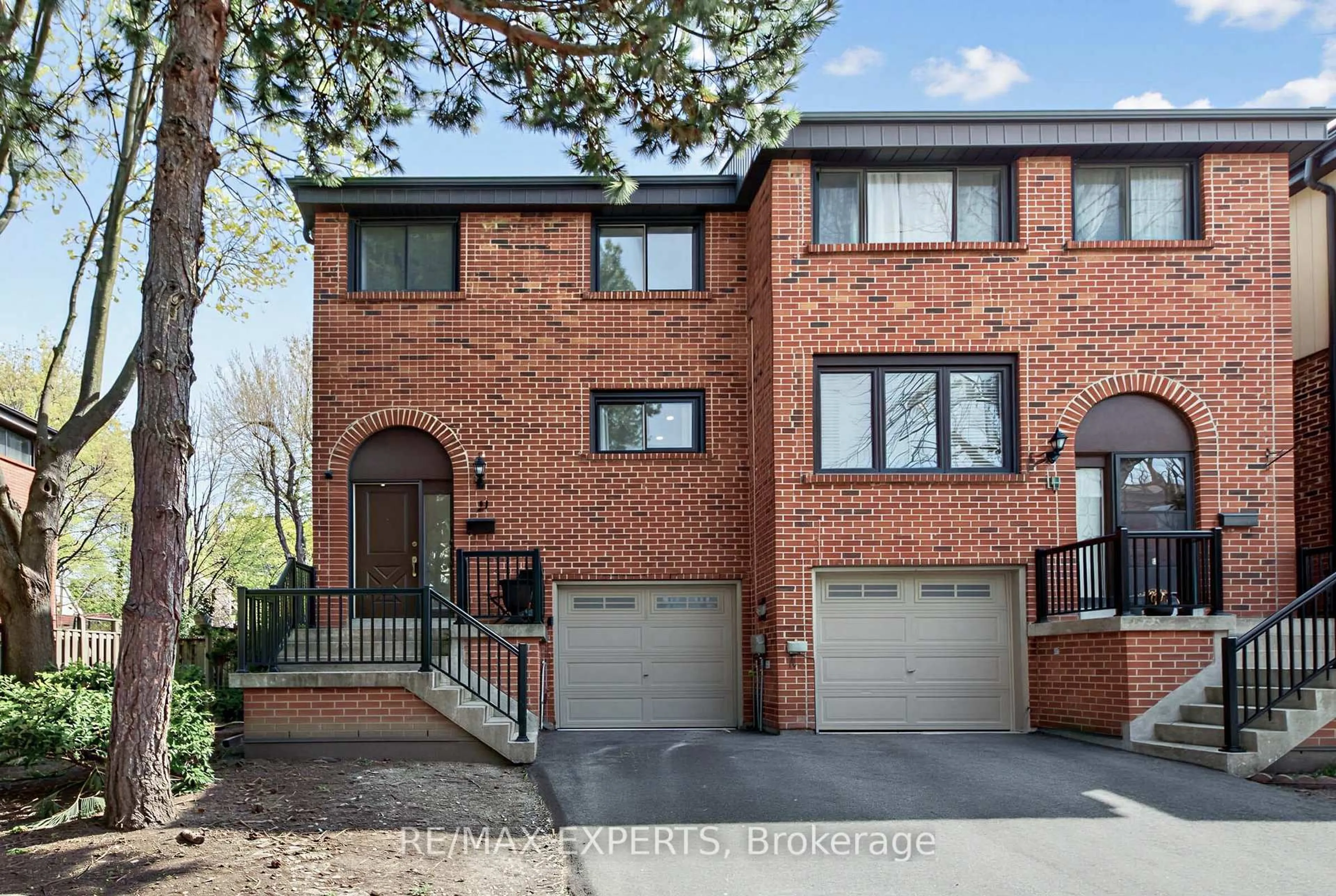 Home with brick exterior material, street for 21 Maple Branch Path #61, Toronto Ontario M9P 3T4