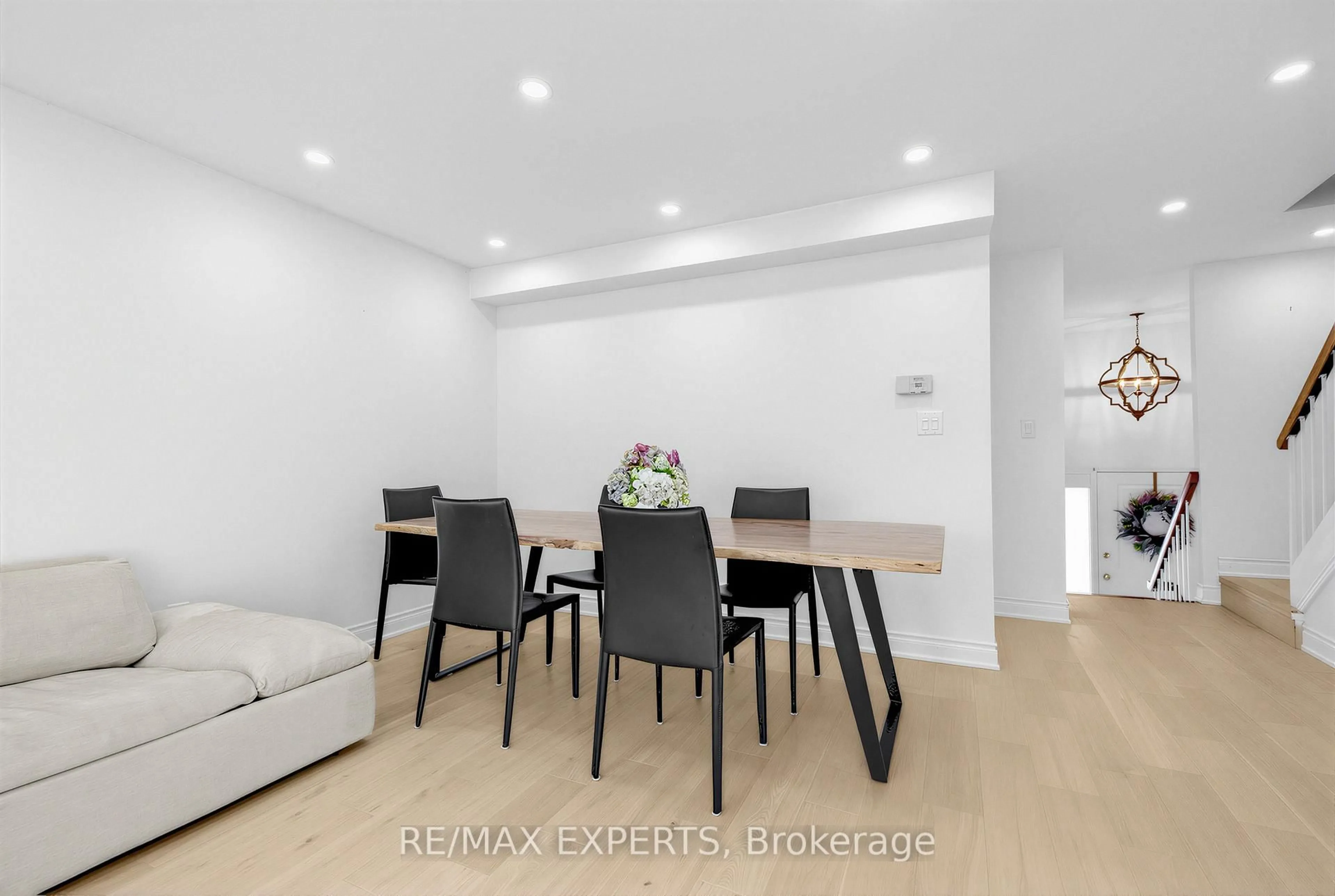 Dining room, wood/laminate floor for 21 Maple Branch Path #61, Toronto Ontario M9P 3T4