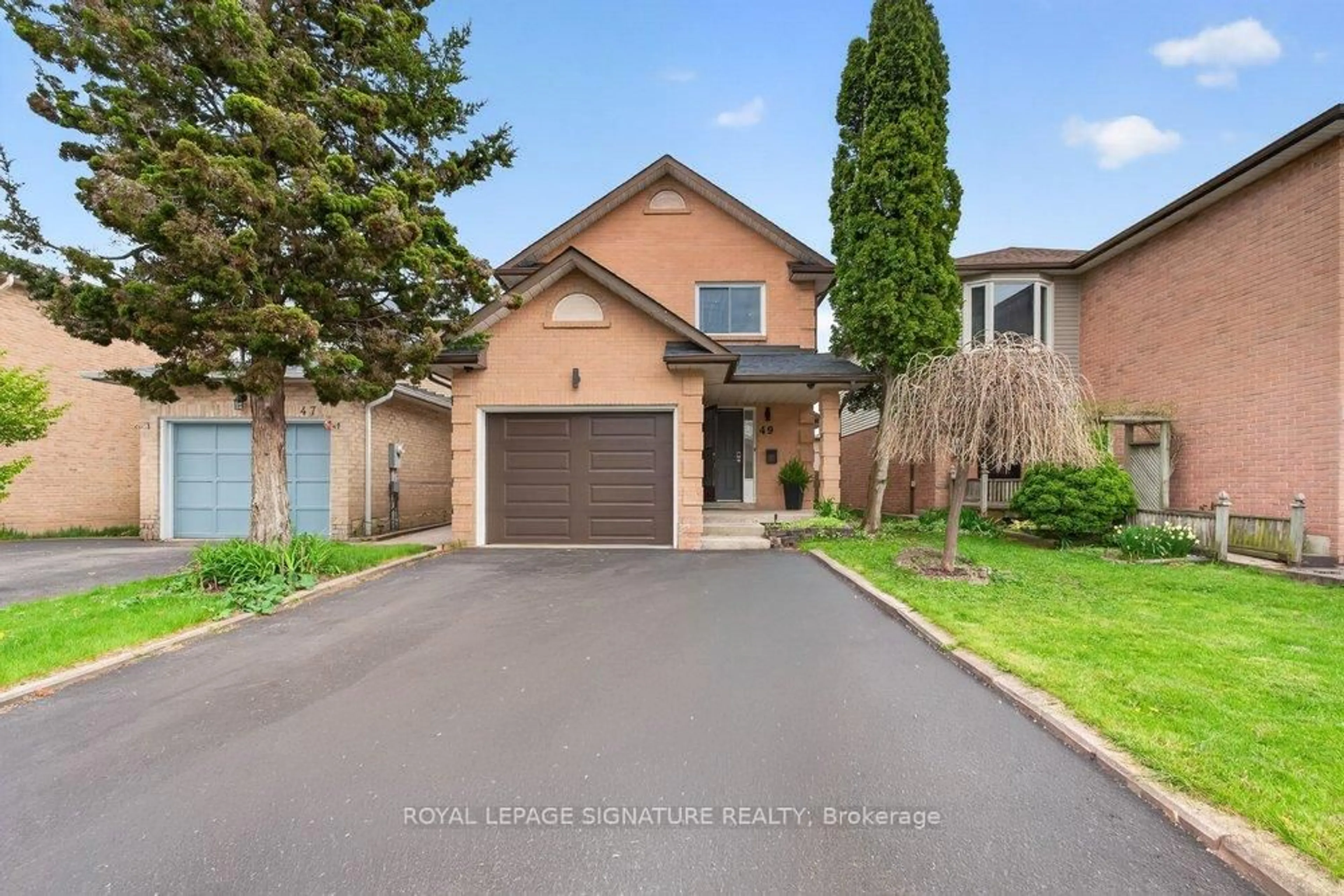 Home with brick exterior material, street for 49 Rosebud Ave, Brampton Ontario L6X 2W4