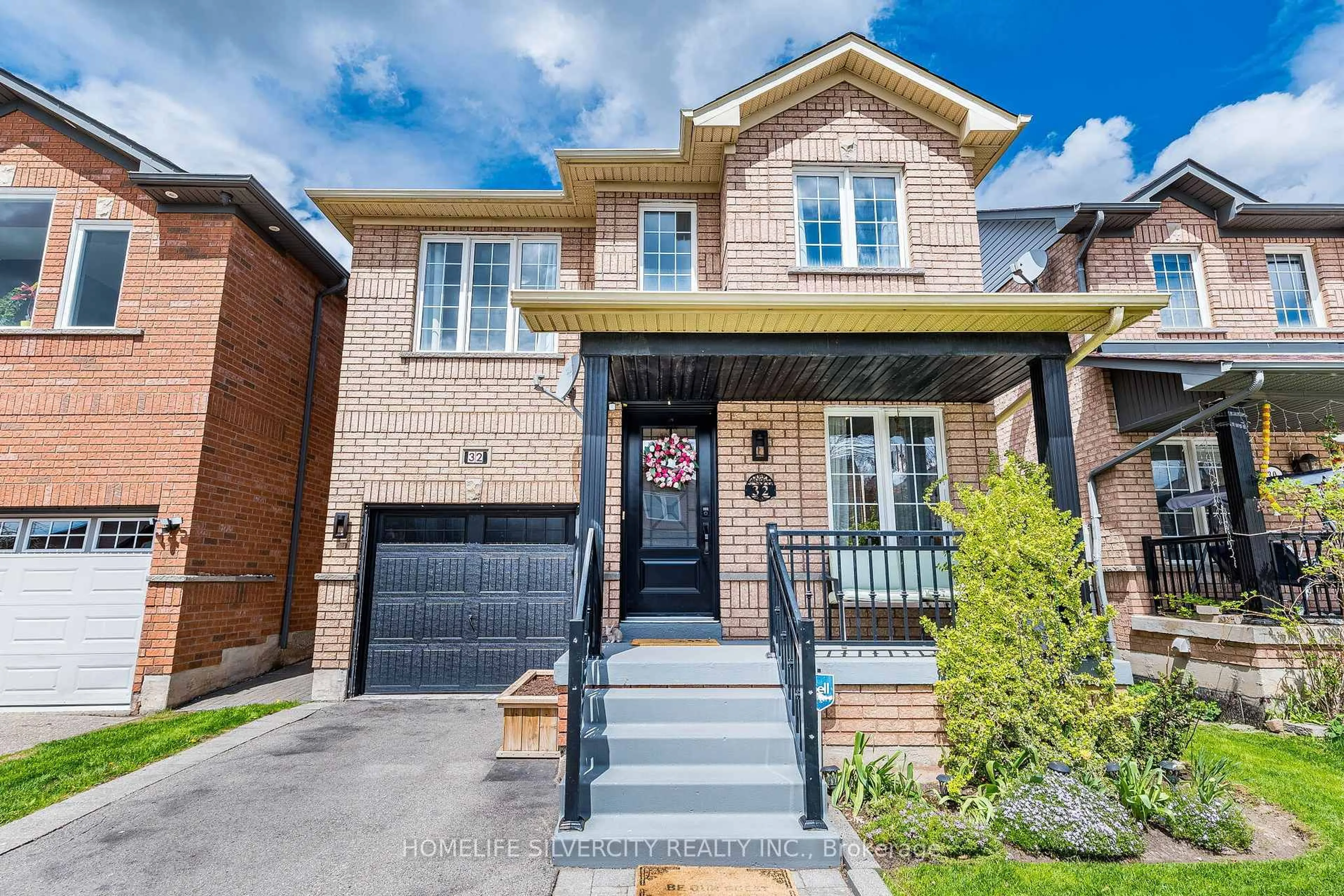 Home with brick exterior material, street for 32 Continental Rd, Brampton Ontario L7A 2E9