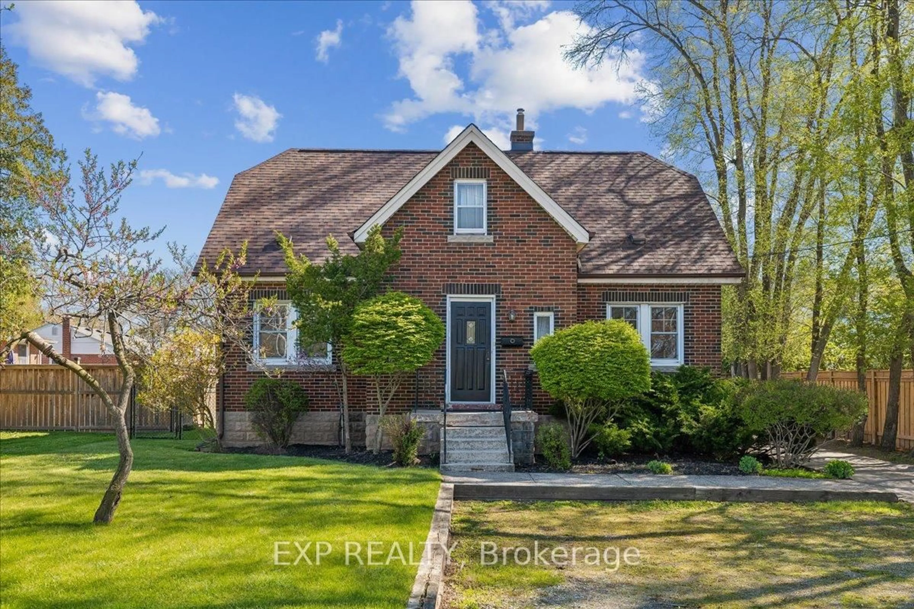 Home with brick exterior material, street for 1025 KING Rd, Burlington Ontario L7T 3L5