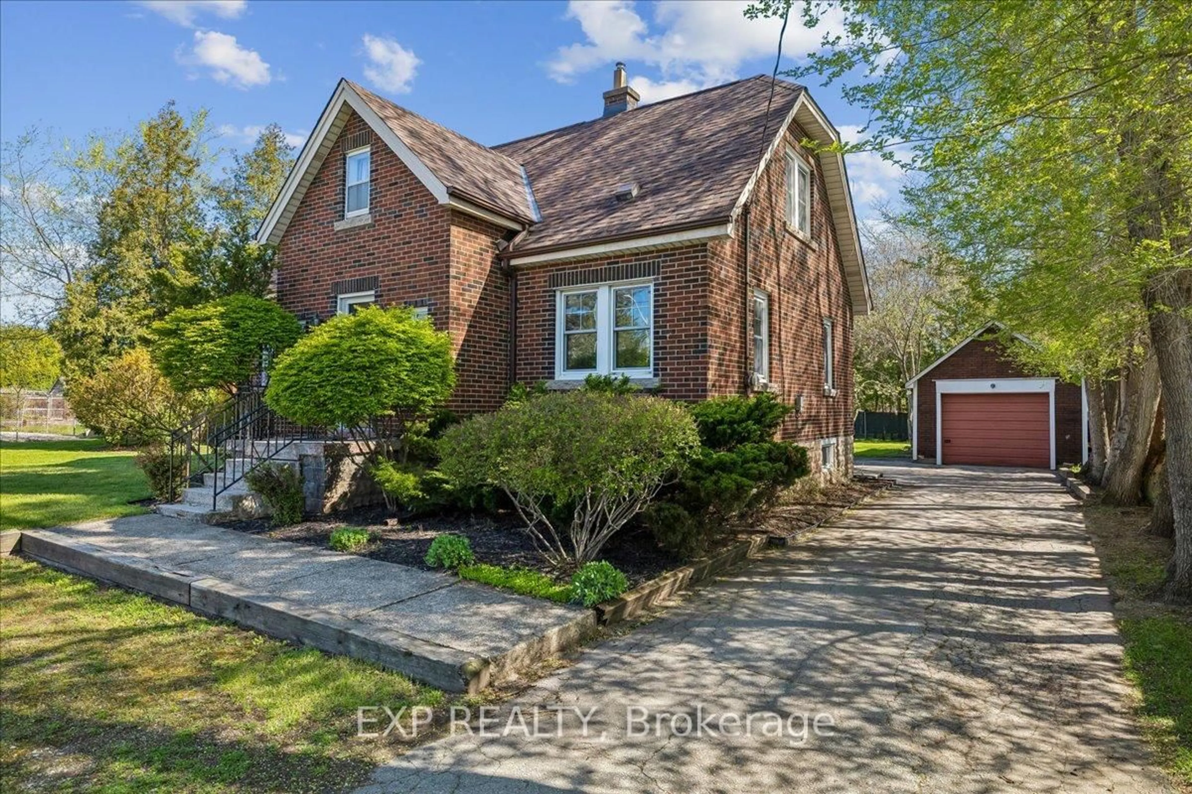 Home with brick exterior material, street for 1025 KING Rd, Burlington Ontario L7T 3L5