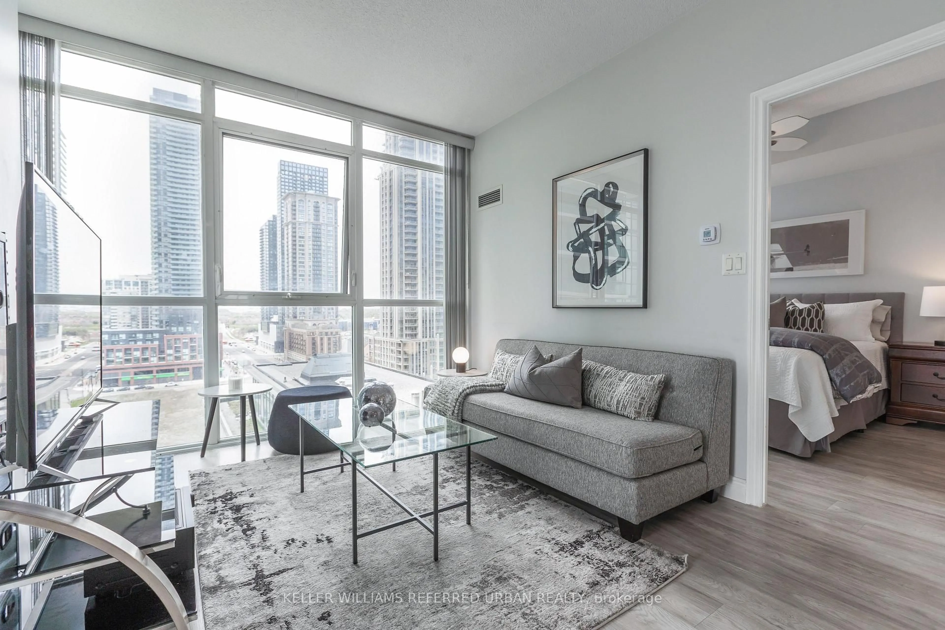 Living room with furniture, unknown for 4070 Confederation Pkwy #1107, Mississauga Ontario L5B 0E9