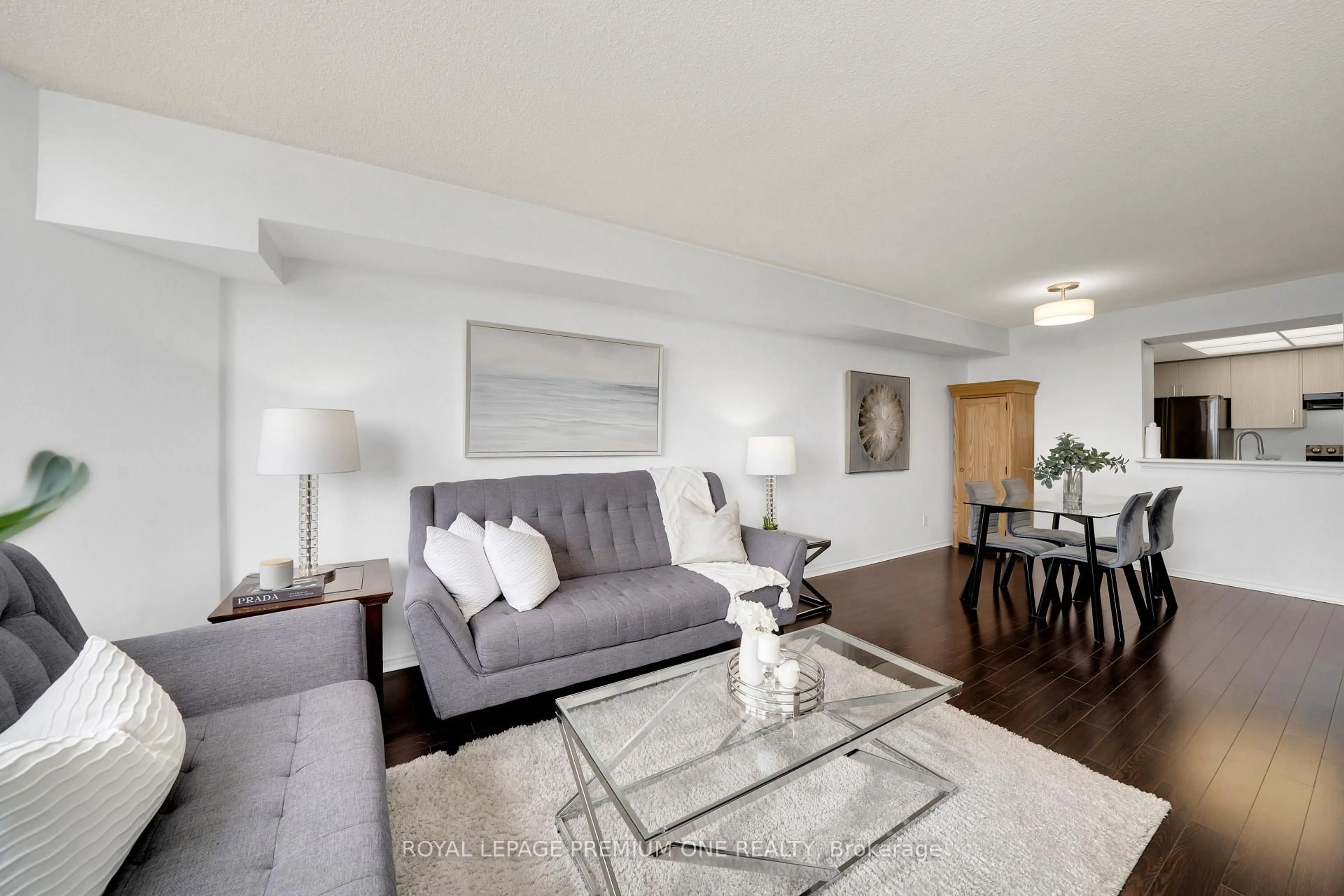 Living room with furniture, unknown for 1001 cedarglen Gate #310, Mississauga Ontario L5C 4R2