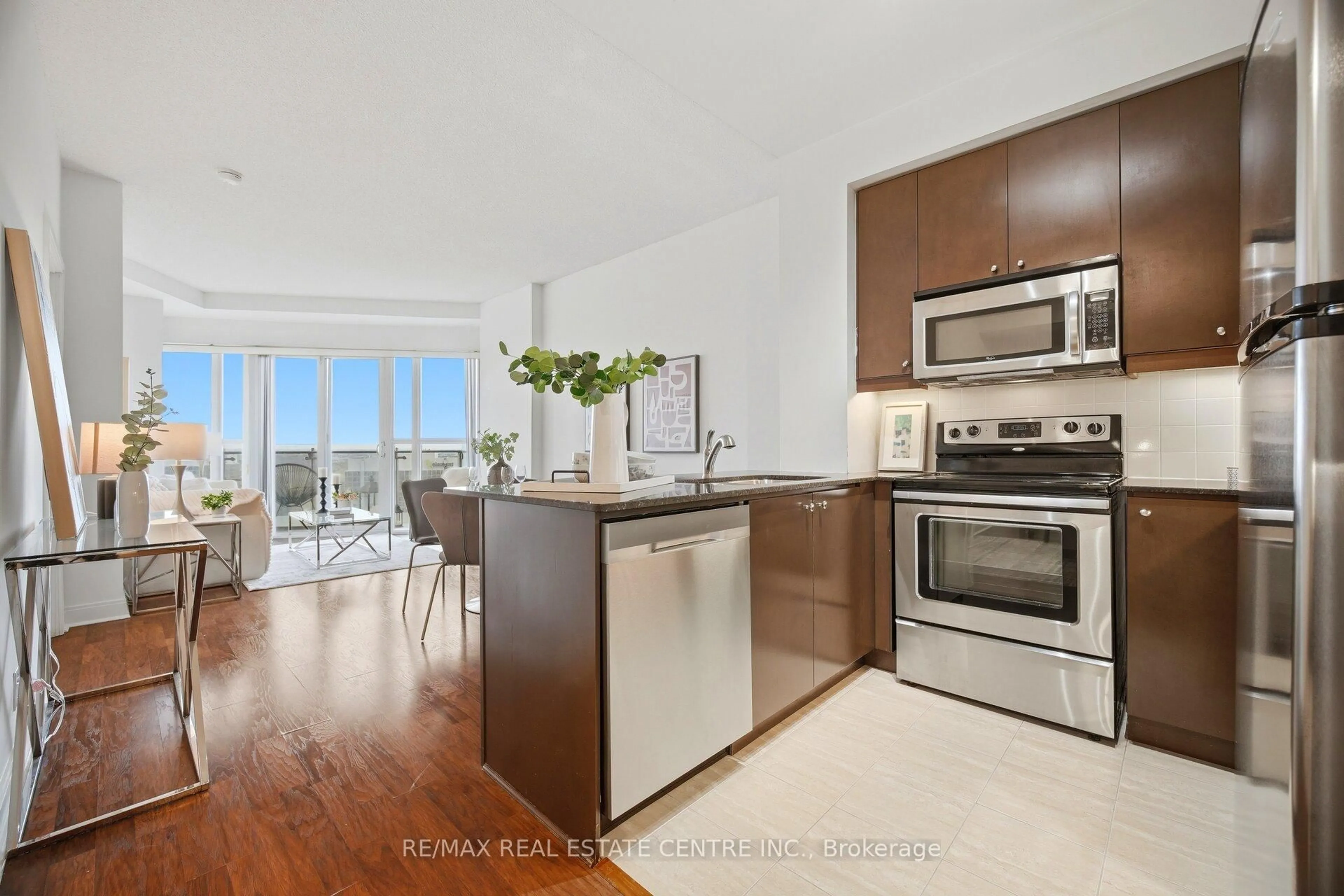 Open concept kitchen, wood/laminate floor for 50 Absolute Ave #2401, Mississauga Ontario L4Z 0A8