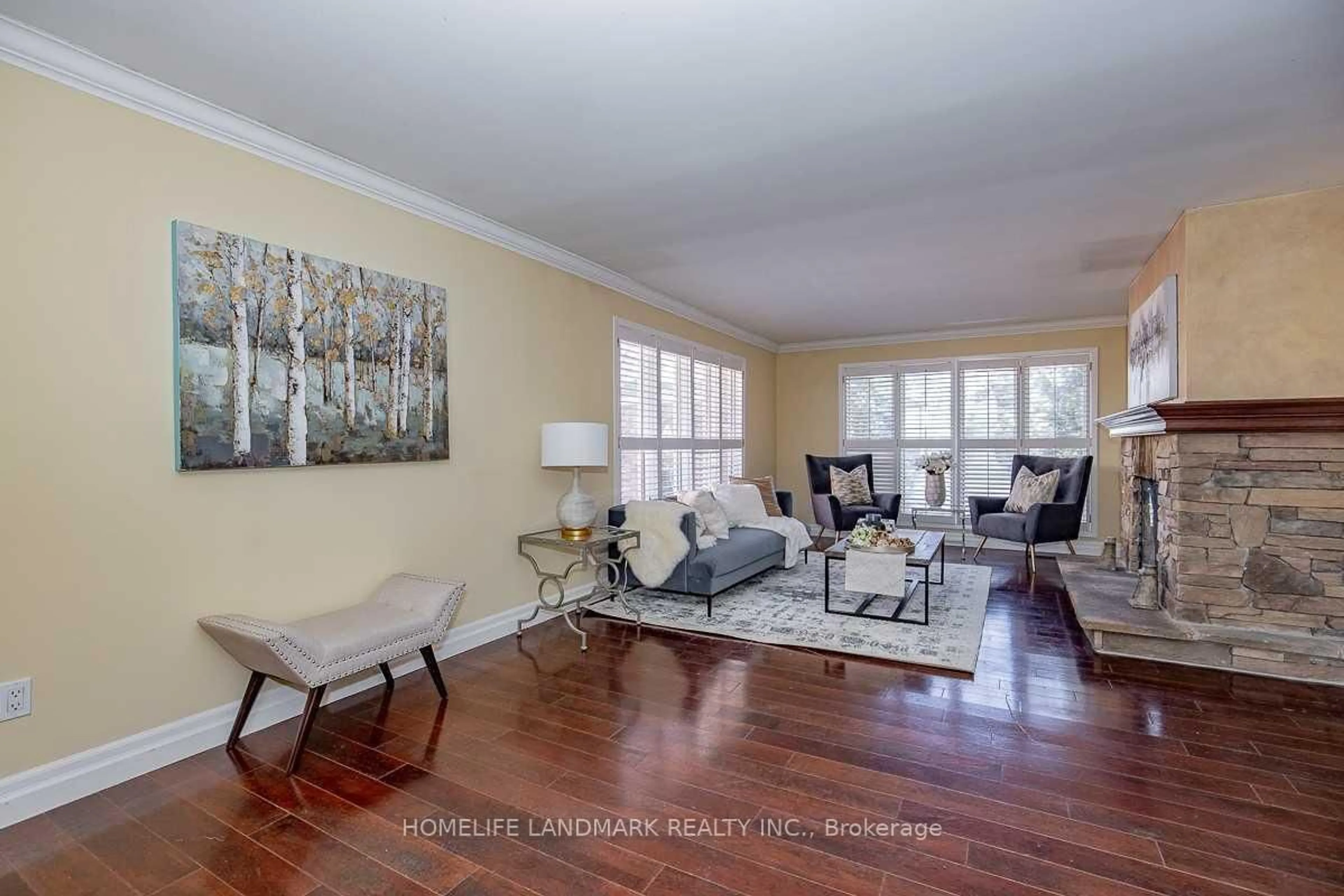 Living room with furniture, wood/laminate floor for 2301 Bennington Gate, Oakville Ontario L6J 5Z4
