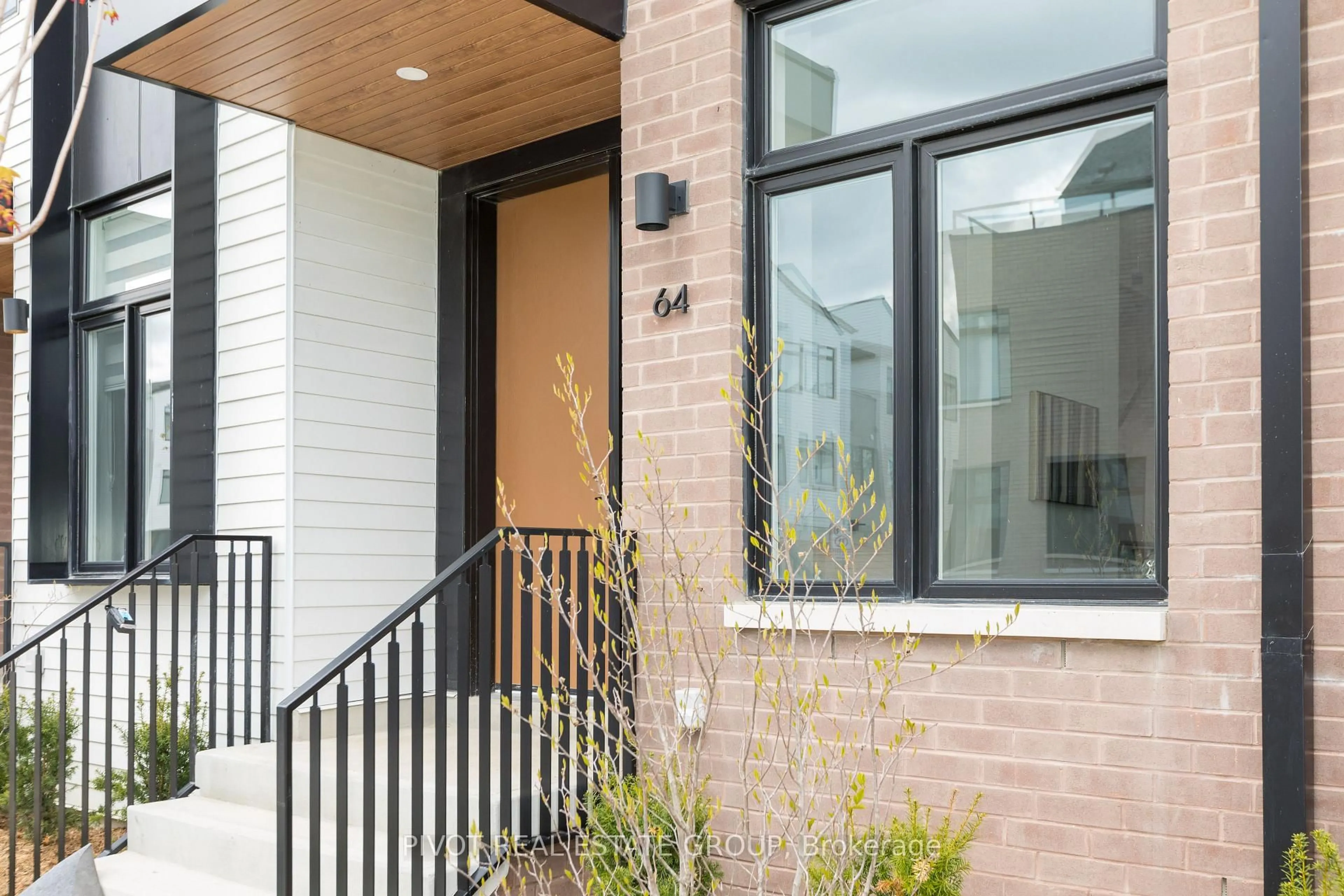 Home with brick exterior material, street for 35 Lou Parsons Way #64, Mississauga Ontario L5H 0B2