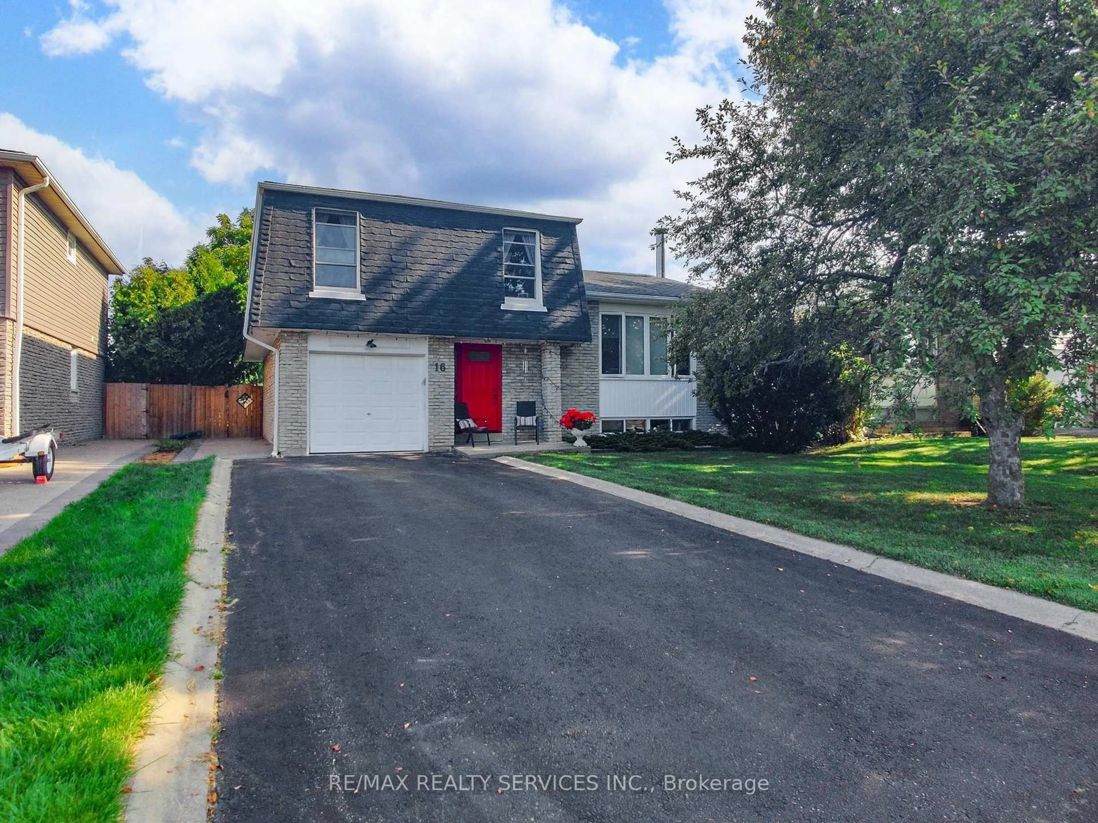 Home with vinyl exterior material, street for 16 Grassington Cres, Brampton Ontario L6S 1Z6