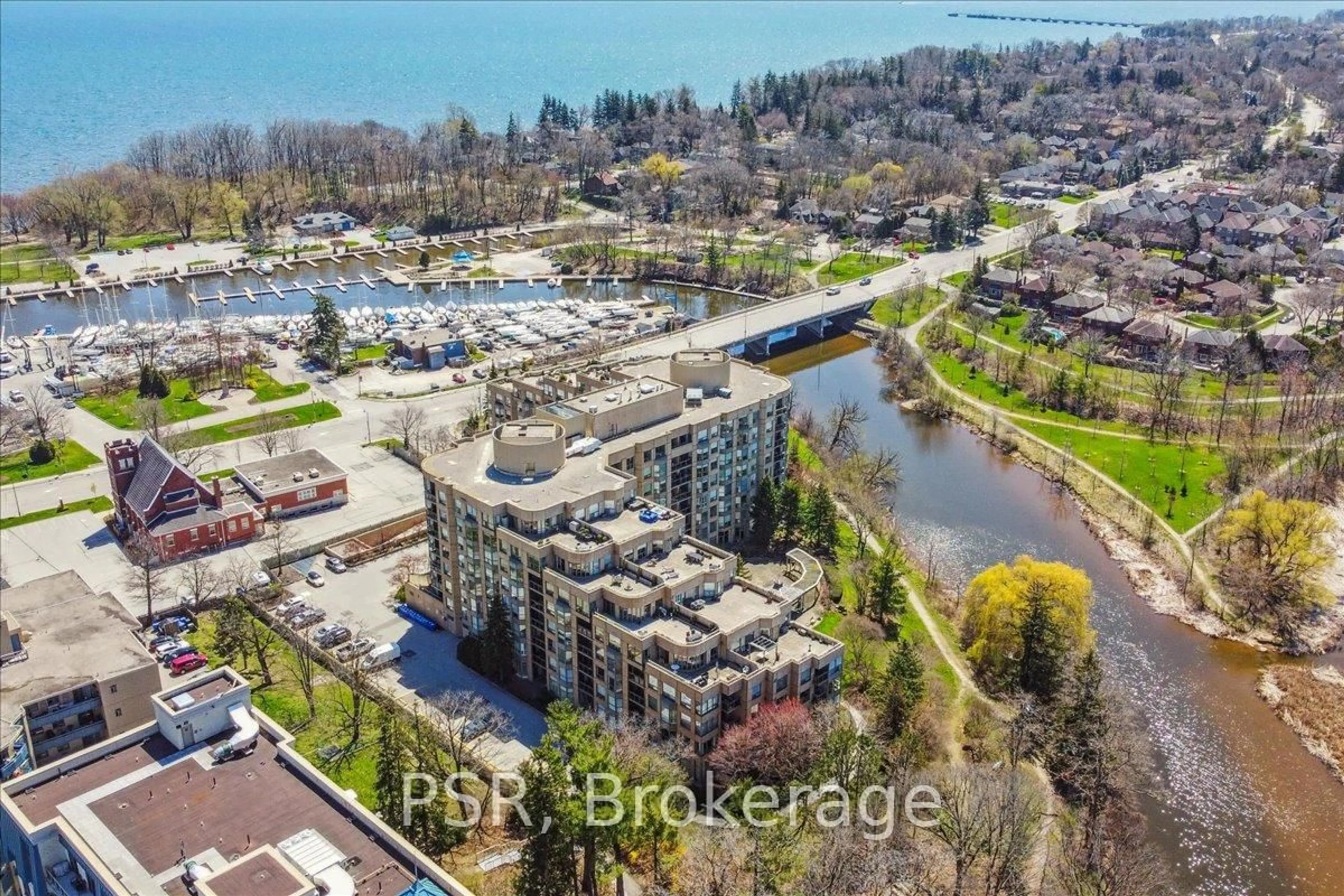 A pic from outside/outdoor area/front of a property/back of a property/a pic from drone, water/lake/river/ocean view for 2511 Lakeshore Rd #317, Oakville Ontario L6L 6L9