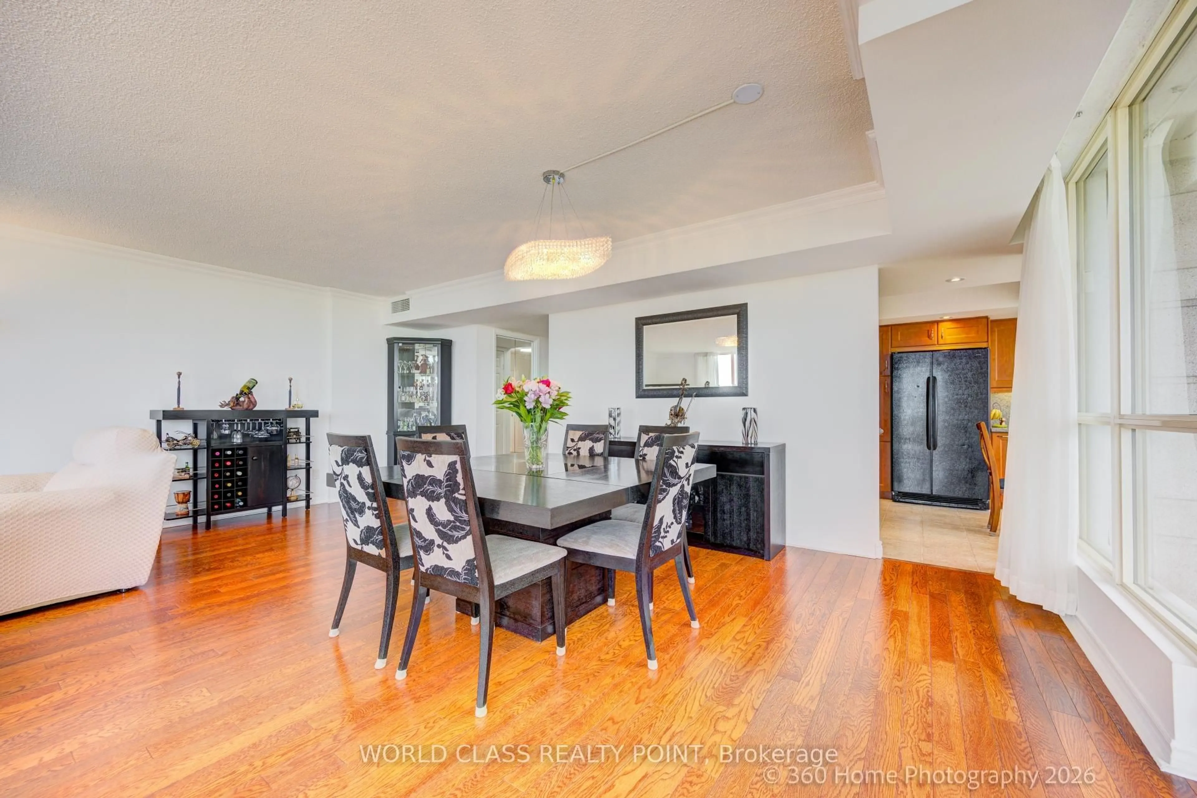 Dining room, wood/laminate floor for 55 Kingsbridge Garden Circ #1811, Mississauga Ontario L5R 1Y1