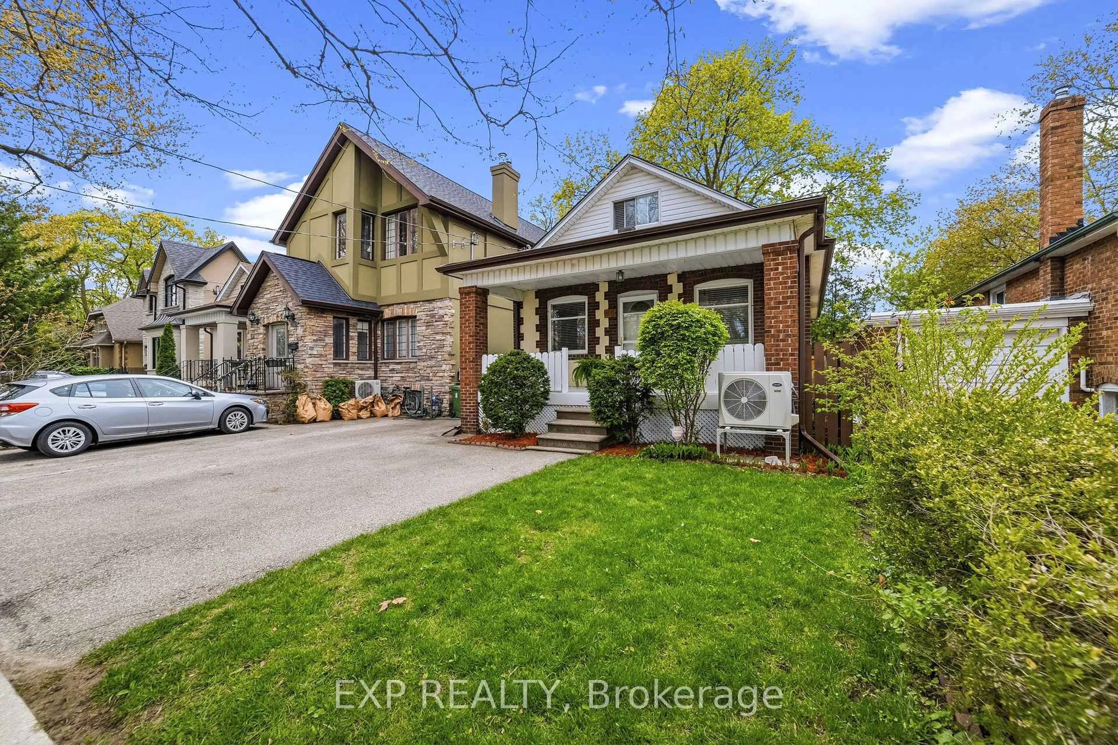Home with brick exterior material, street for 42 Clissold Rd, Toronto Ontario M8Z 4T5