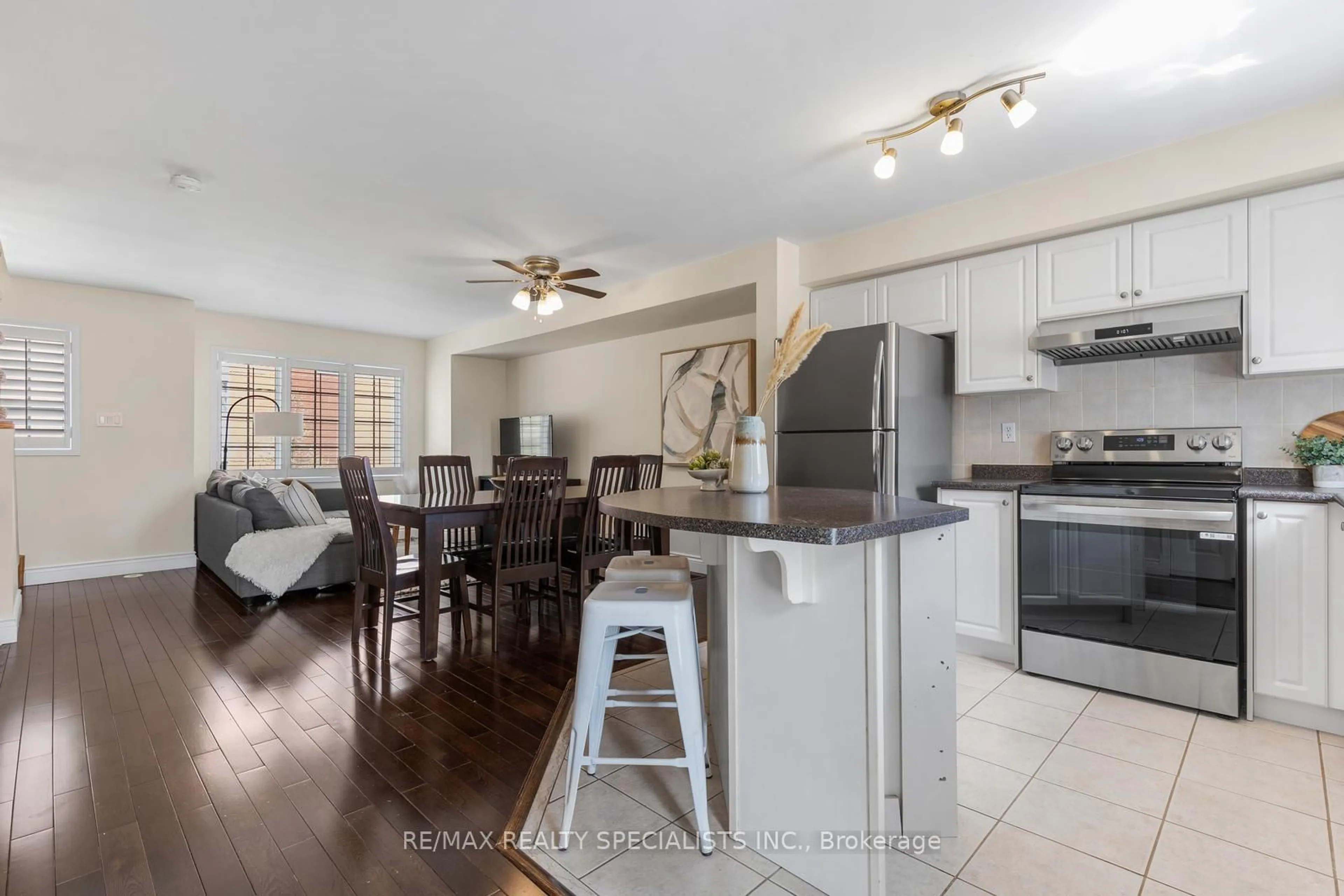 Open concept kitchen, wood/laminate floor for 201 Tenth St #8, Toronto Ontario M8V 4C7