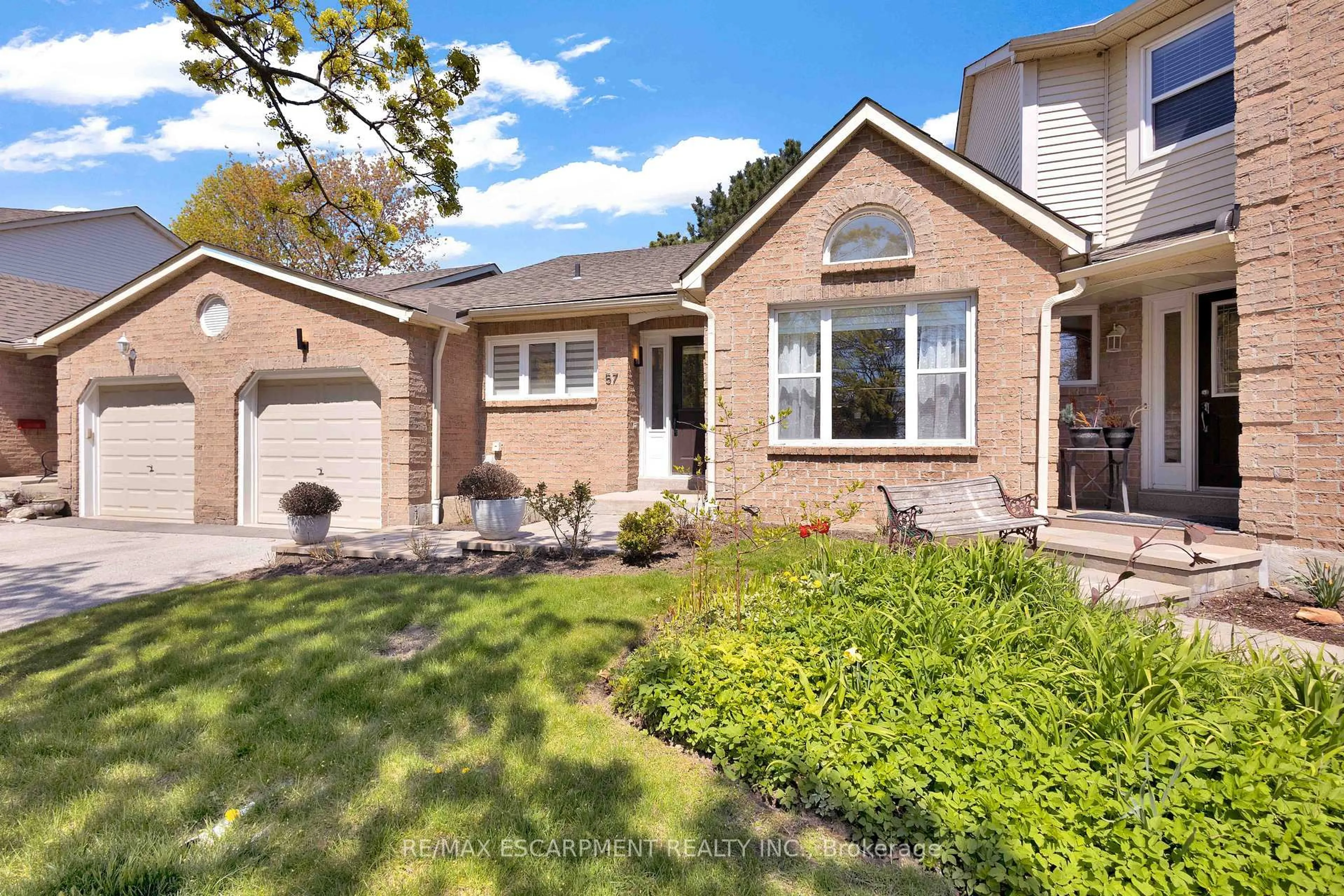 Home with brick exterior material, street for 5255 Lakeshore Rd #57, Burlington Ontario L7L 5X9