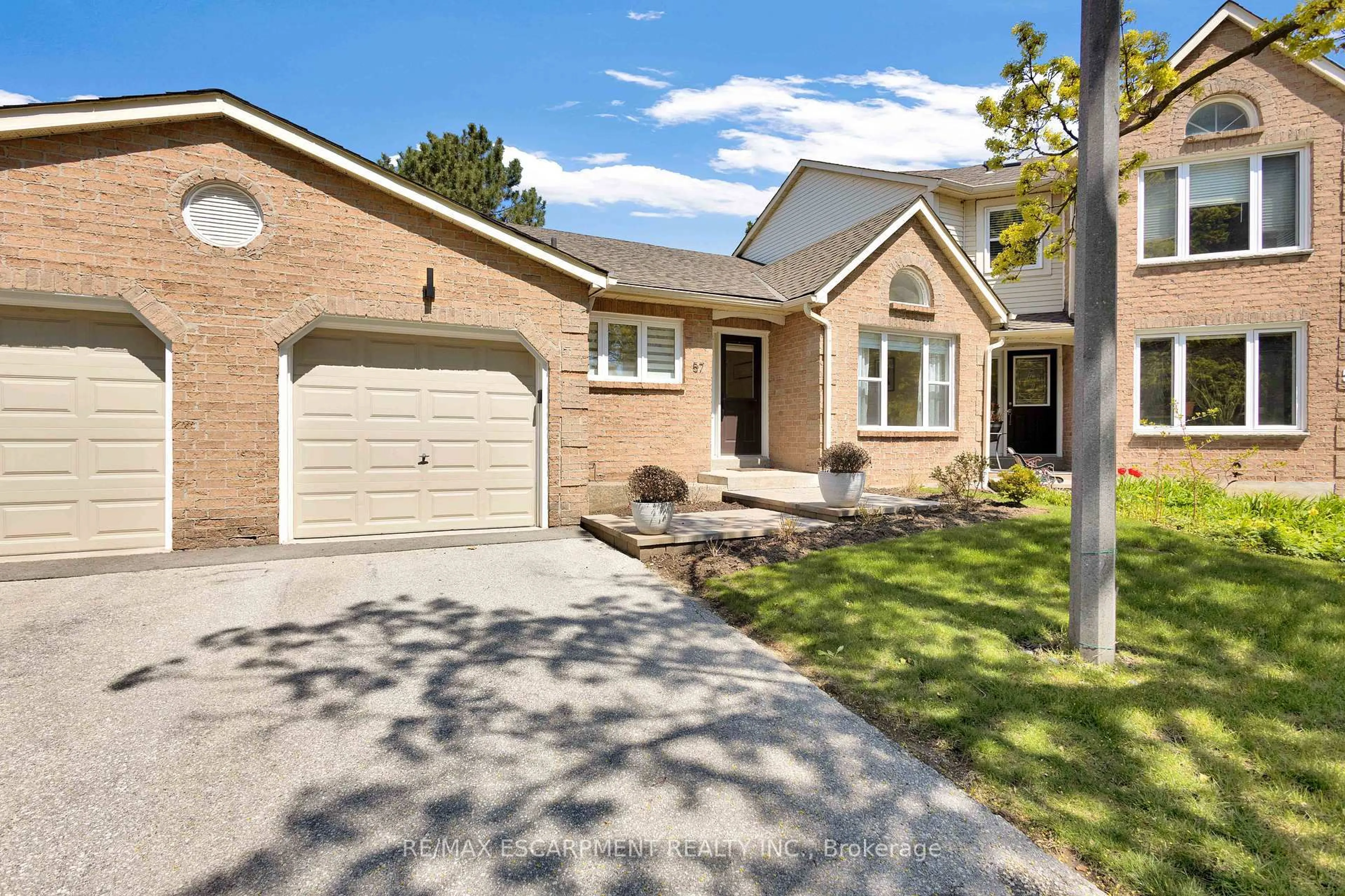 Home with brick exterior material, street for 5255 Lakeshore Rd #57, Burlington Ontario L7L 5X9