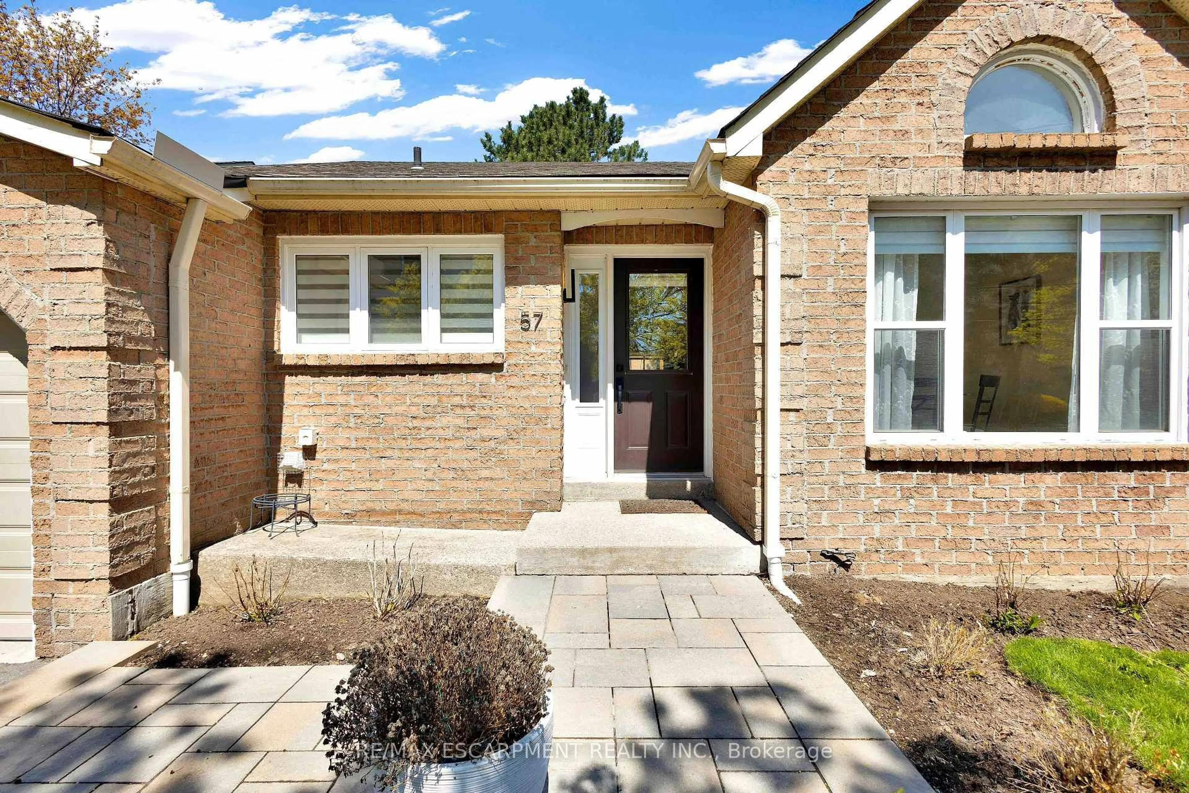 Home with brick exterior material, street for 5255 Lakeshore Rd #57, Burlington Ontario L7L 5X9