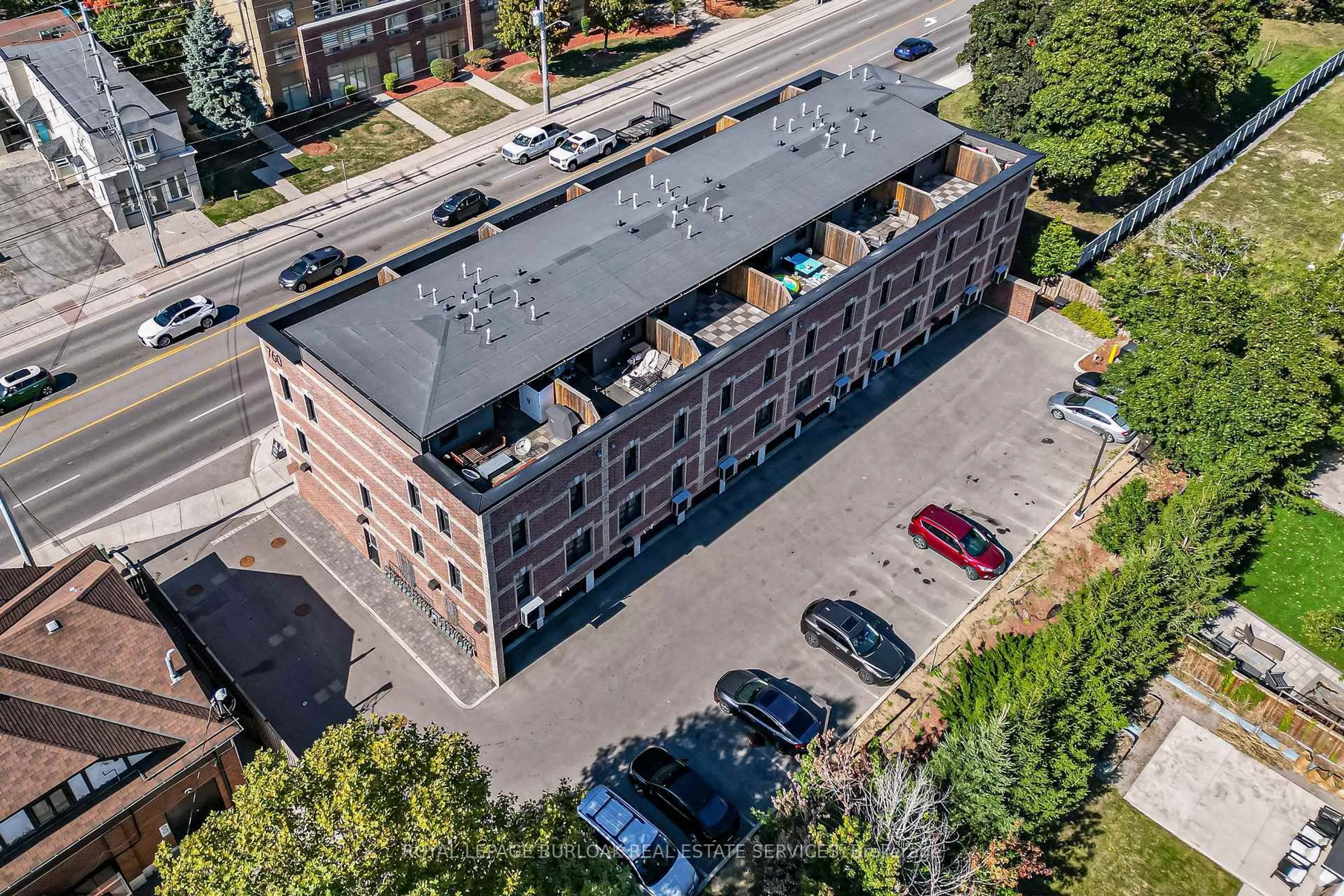 A pic from outside/outdoor area/front of a property/back of a property/a pic from drone, unknown for 760 Lakeshore Rd #201, Mississauga Ontario L5E 1C7