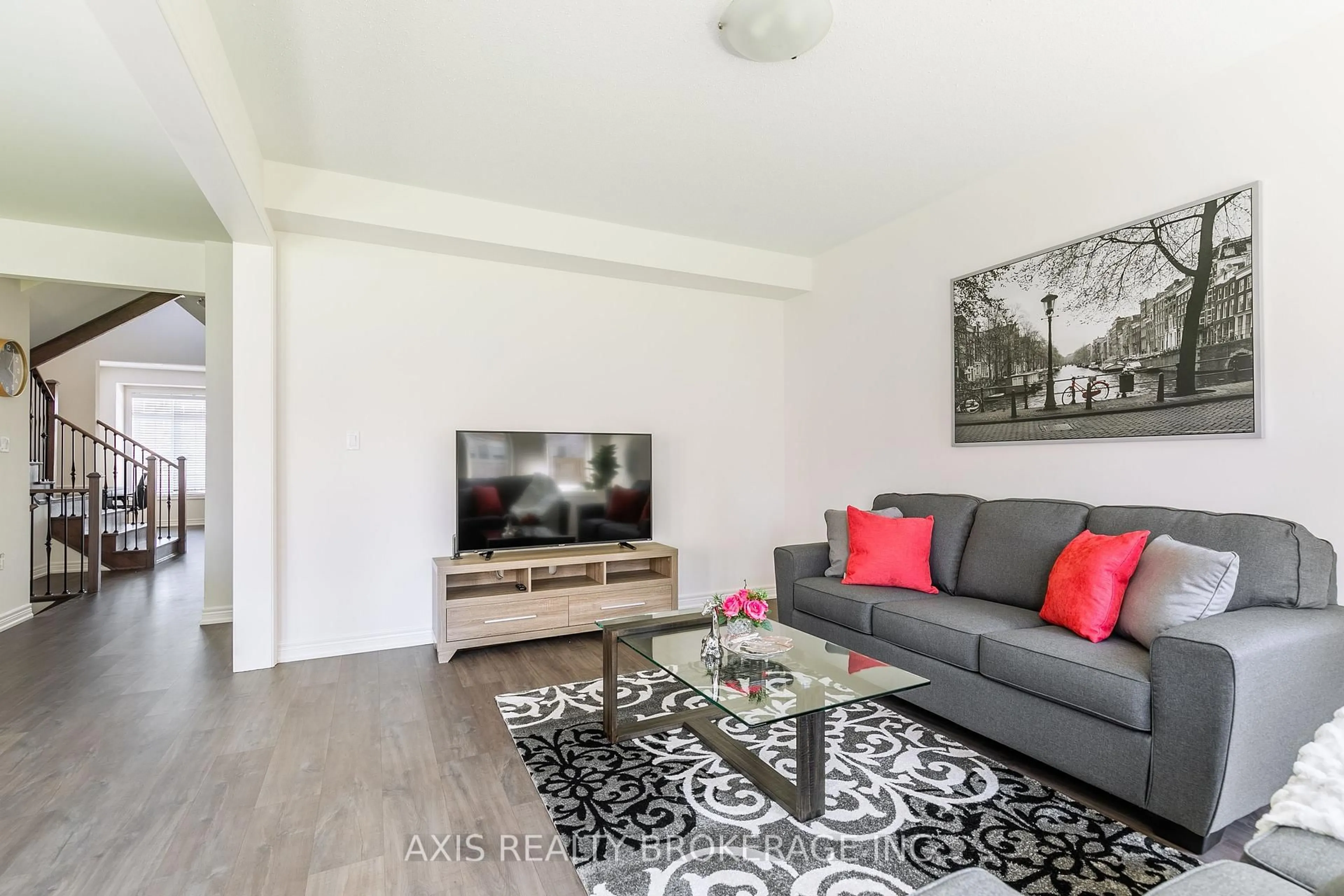 Living room with furniture, wood/laminate floor for 445 Silver Maple Rd, Oakville Ontario L6H 0S3