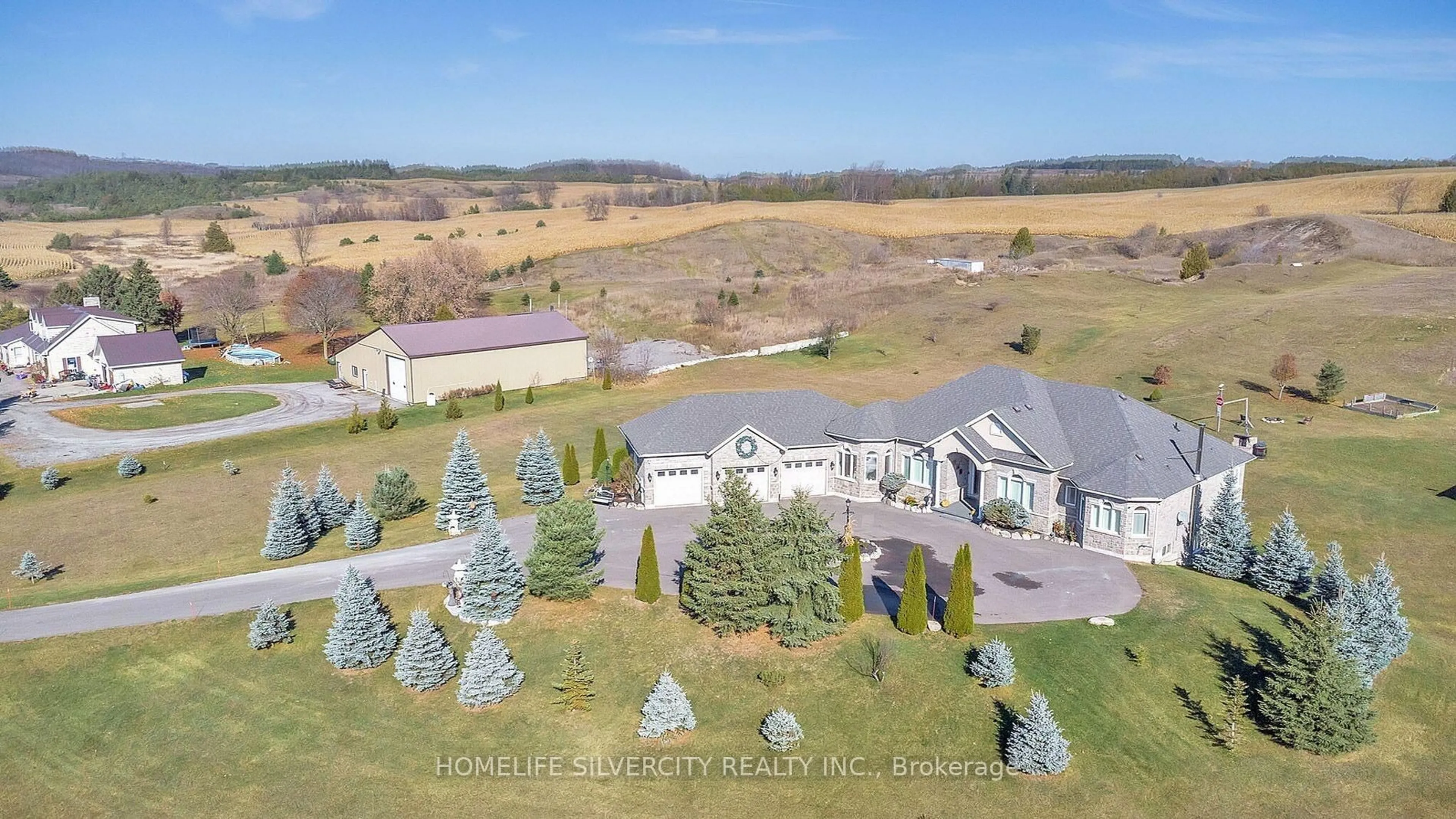 A pic from outside/outdoor area/front of a property/back of a property/a pic from drone, mountain view for 20051 Willoughby Rd, Caledon Ontario L7K 1W1