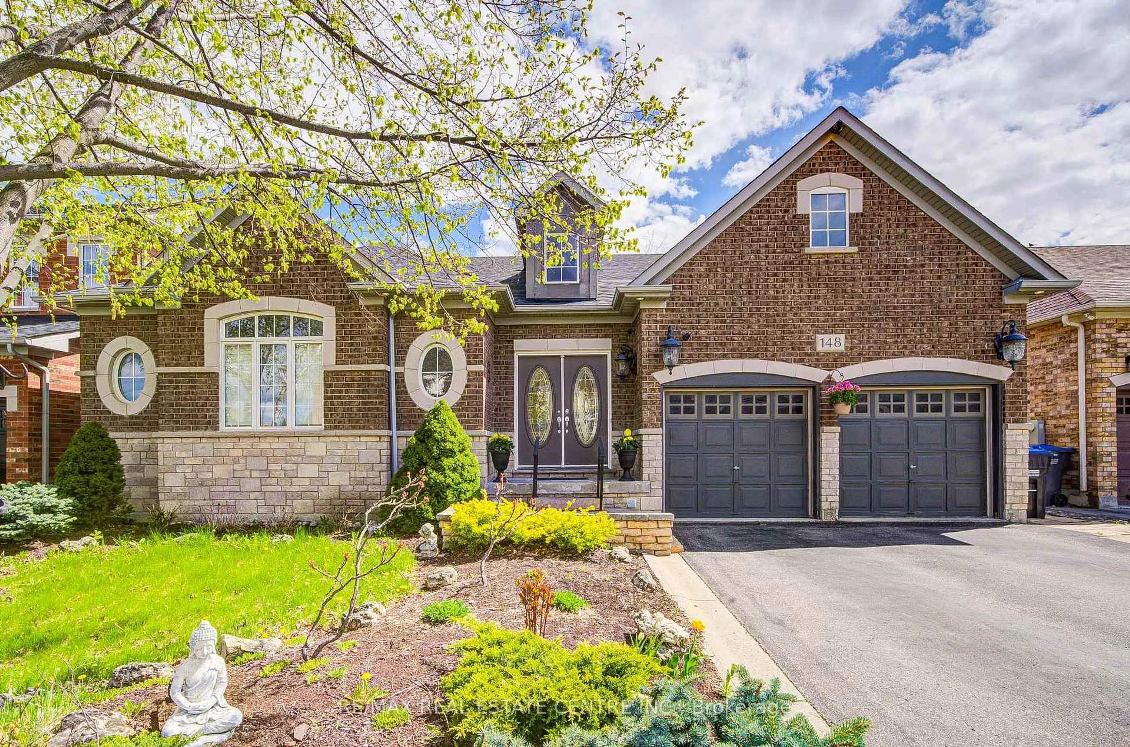 Home with brick exterior material, street for 148 Bonistel Cres, Brampton Ontario L7A 3H1