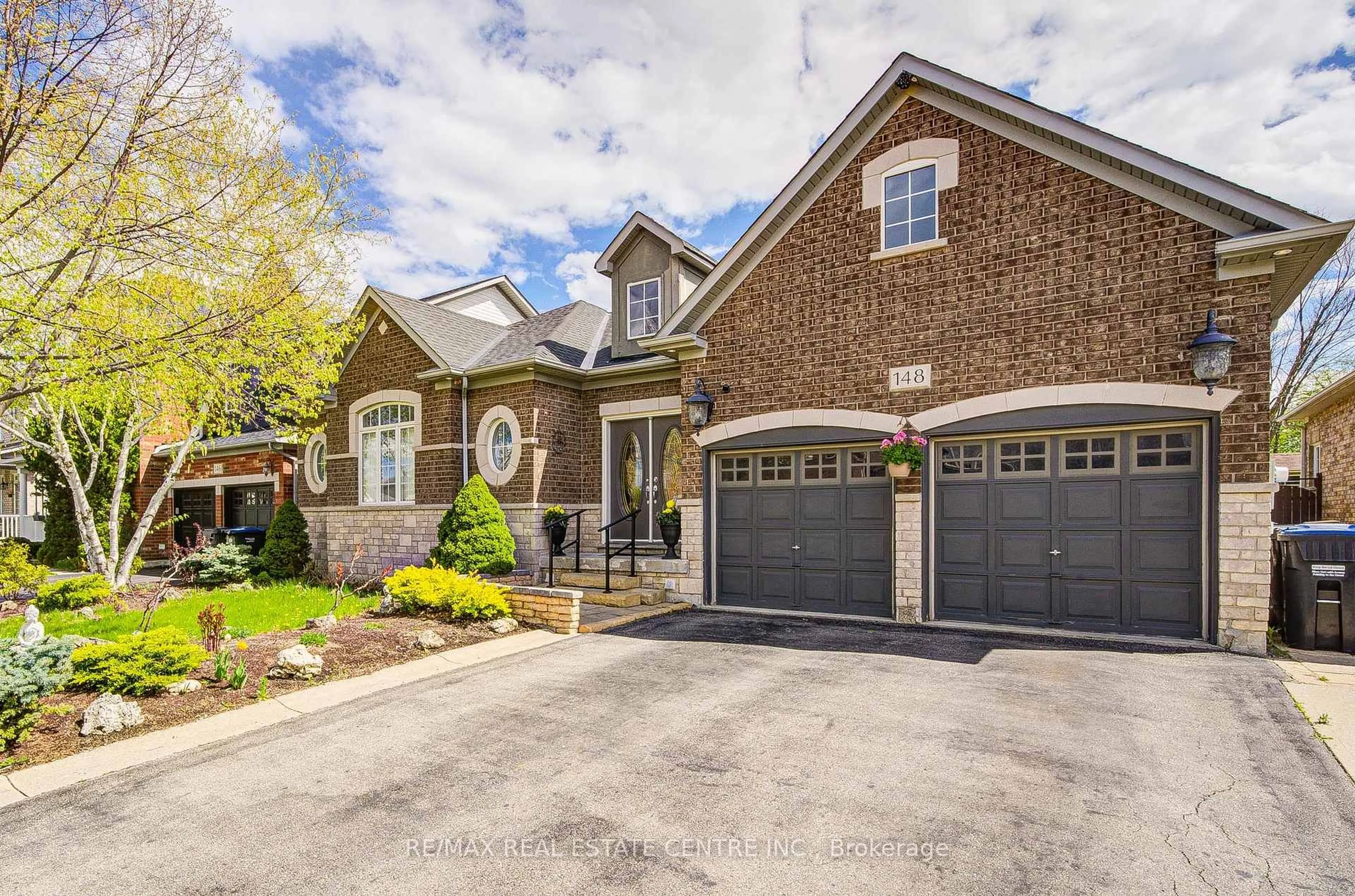 Home with brick exterior material, street for 148 Bonistel Cres, Brampton Ontario L7A 3H1
