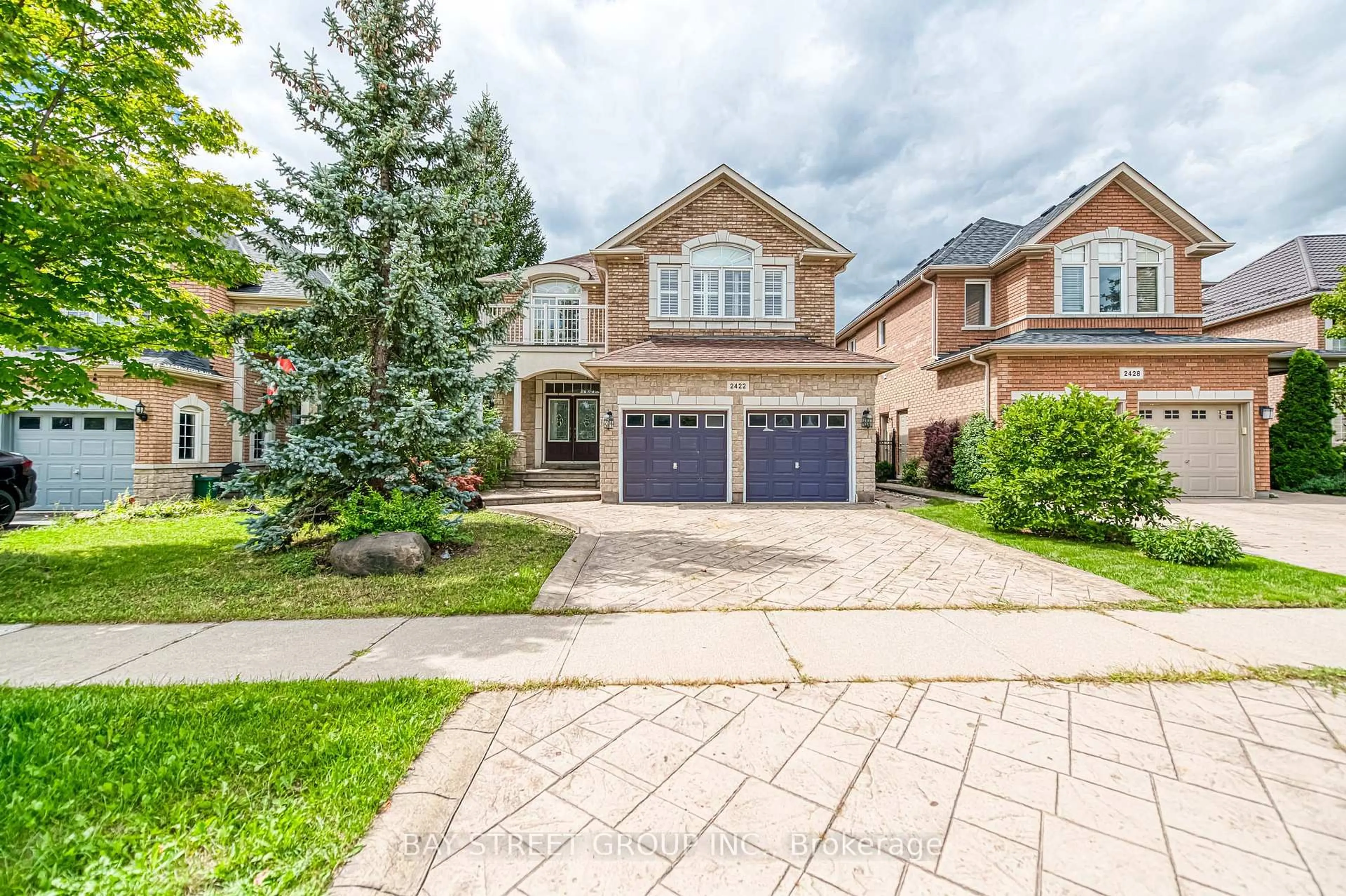 Home with brick exterior material, street for 2422 Hertfordshire Way, Oakville Ontario L6H 7M5