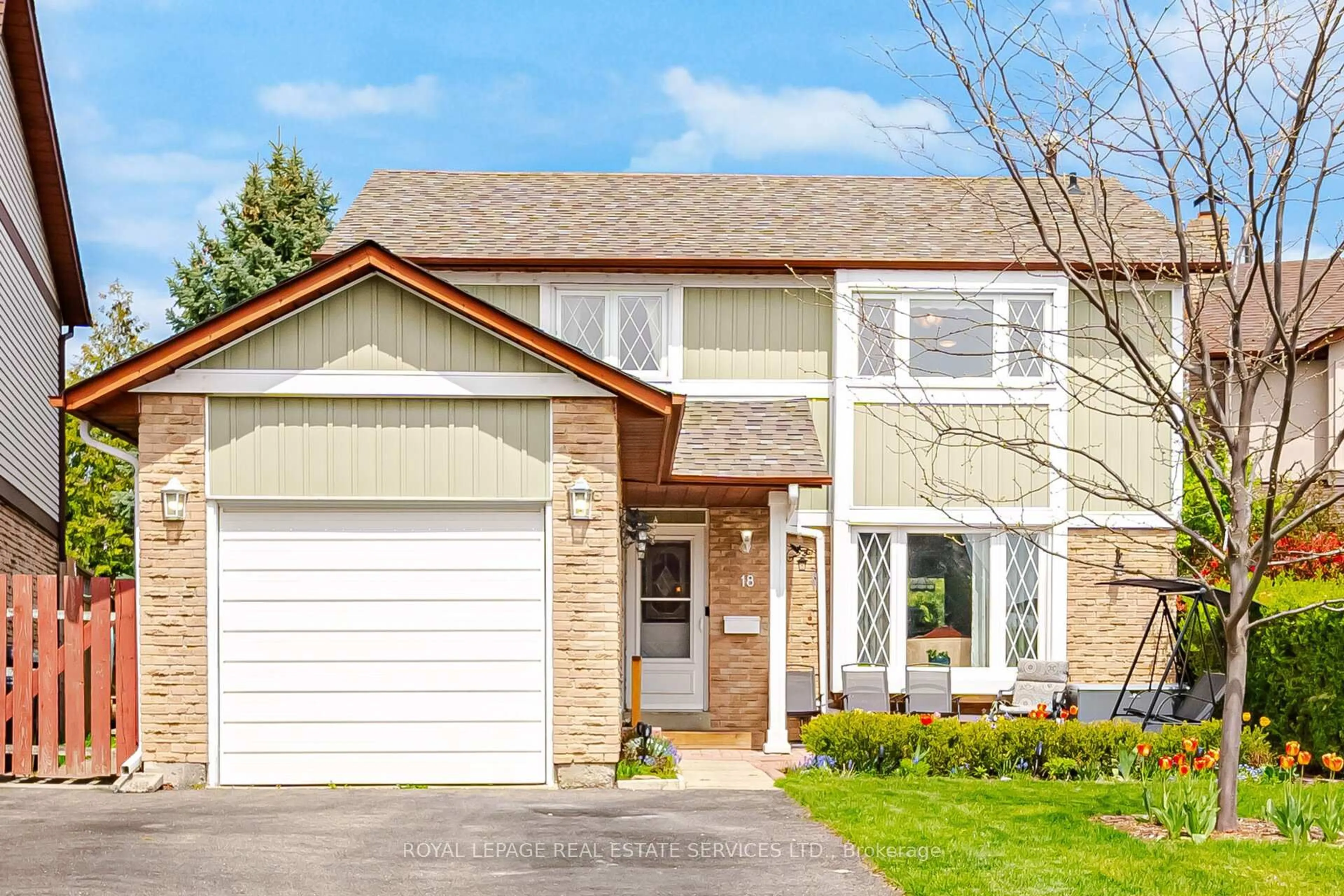 Home with vinyl exterior material, street for 18 Wolverton Cres, Brampton Ontario L6S 3L1
