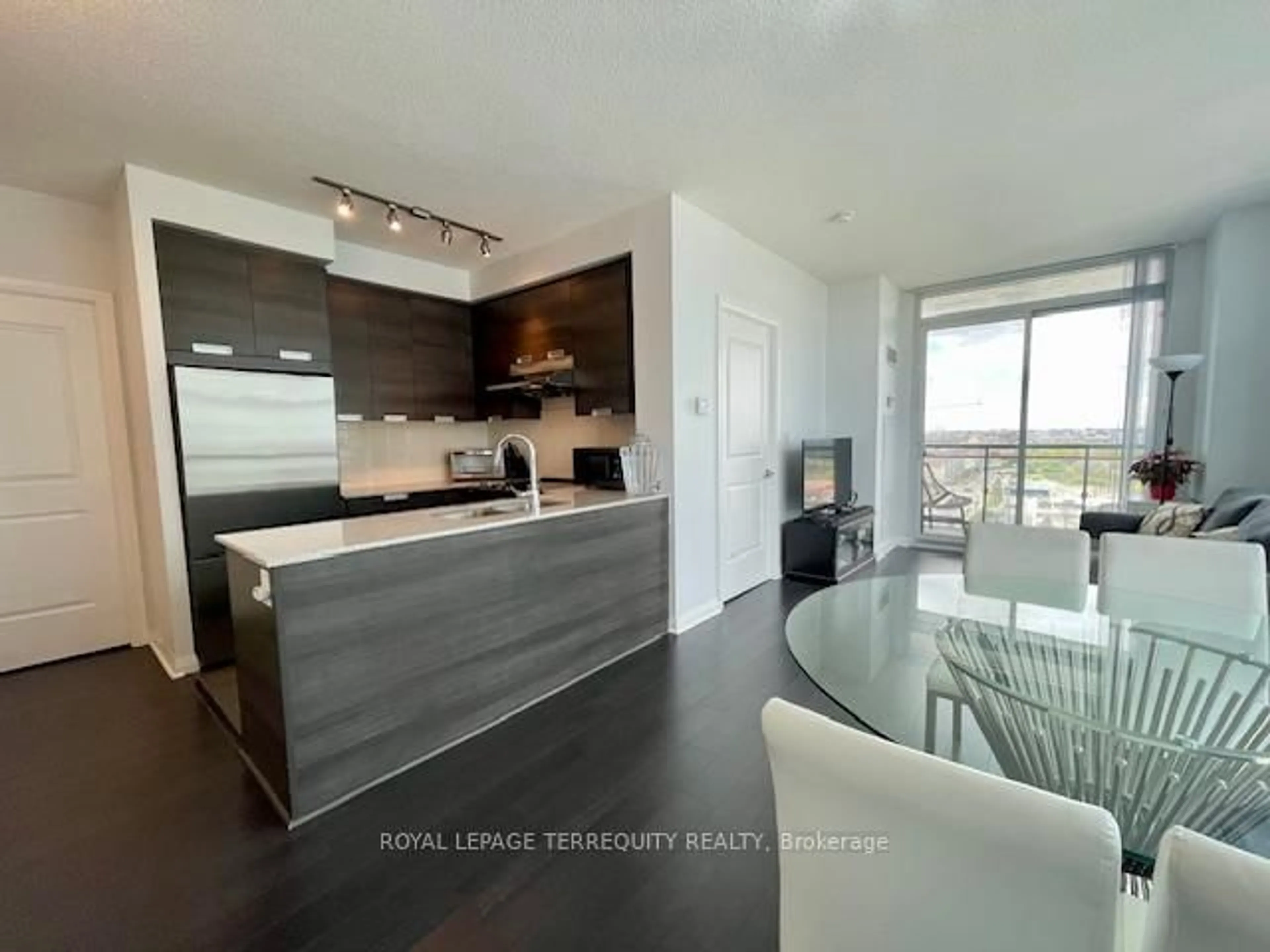 Open concept kitchen, wood/laminate floor for 5033 Four Springs Ave #1219, Mississauga Ontario L5R 0G6