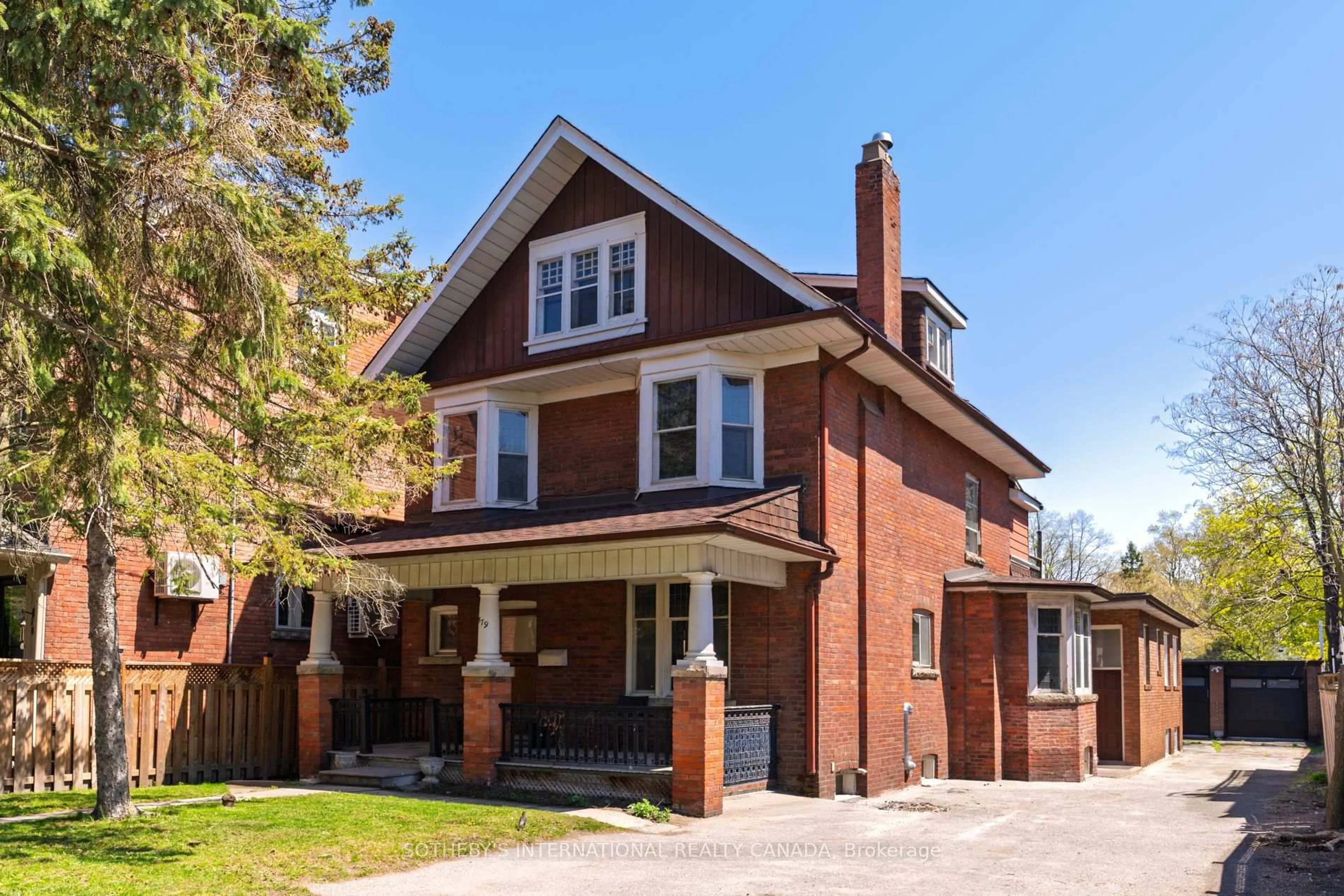 Home with brick exterior material, street for 579 Indian Rd, Toronto Ontario M6P 2C3
