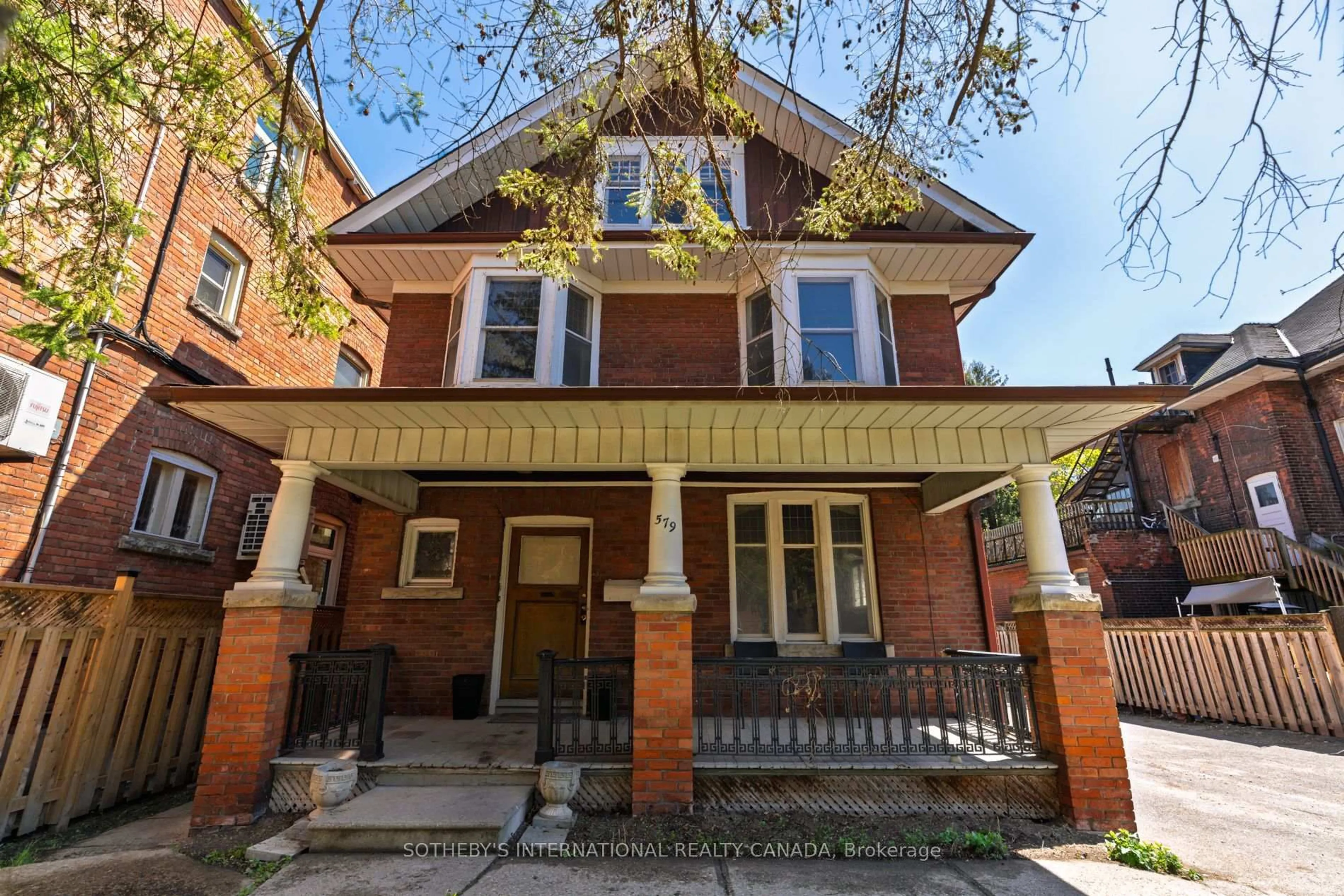 Home with brick exterior material, street for 579 Indian Rd, Toronto Ontario M6P 2C3