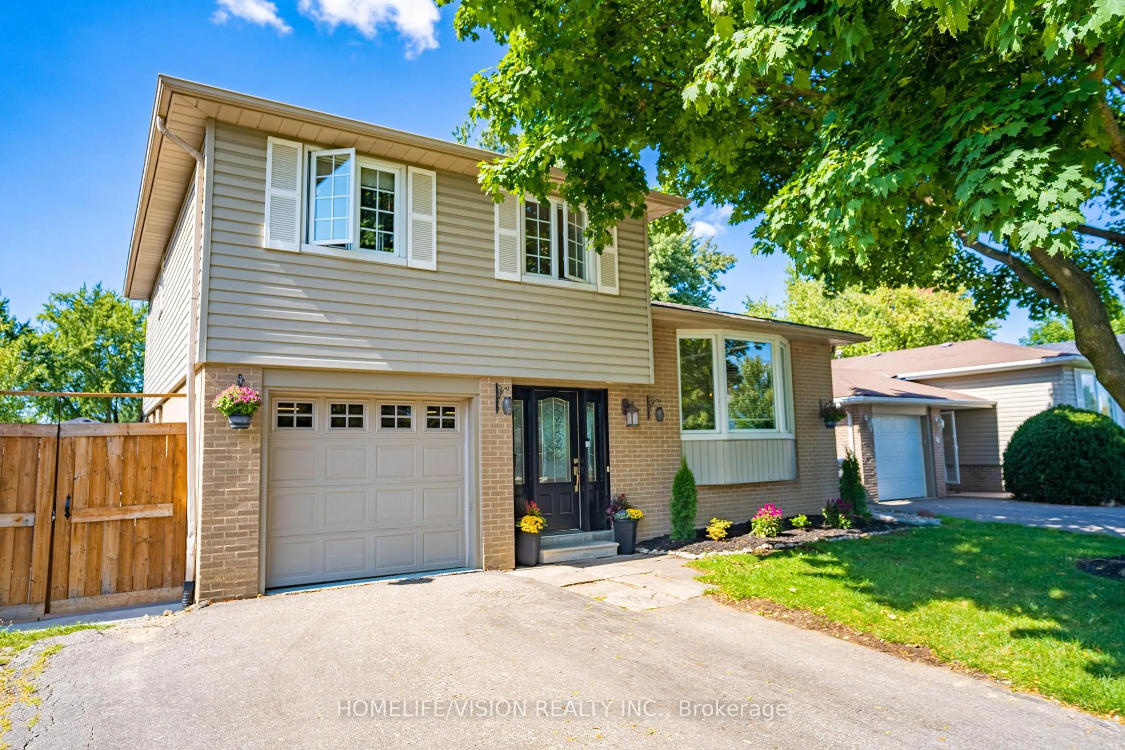 Home with vinyl exterior material, street for 16 Palgrave Cres, Brampton Ontario L6W 1C9