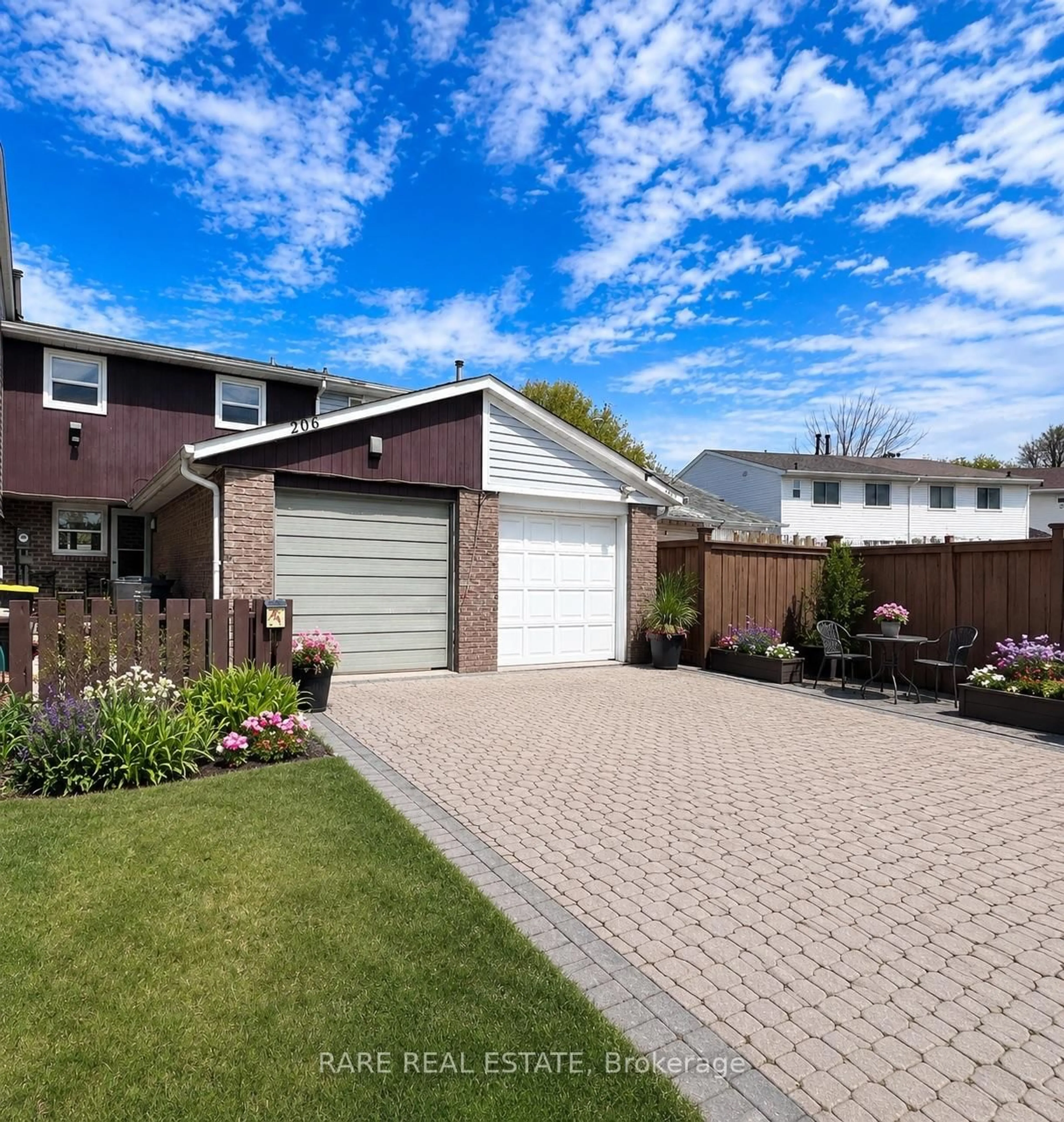 Home with brick exterior material, street for 206 Royal Salisbury Way, Brampton Ontario L6V 3J9