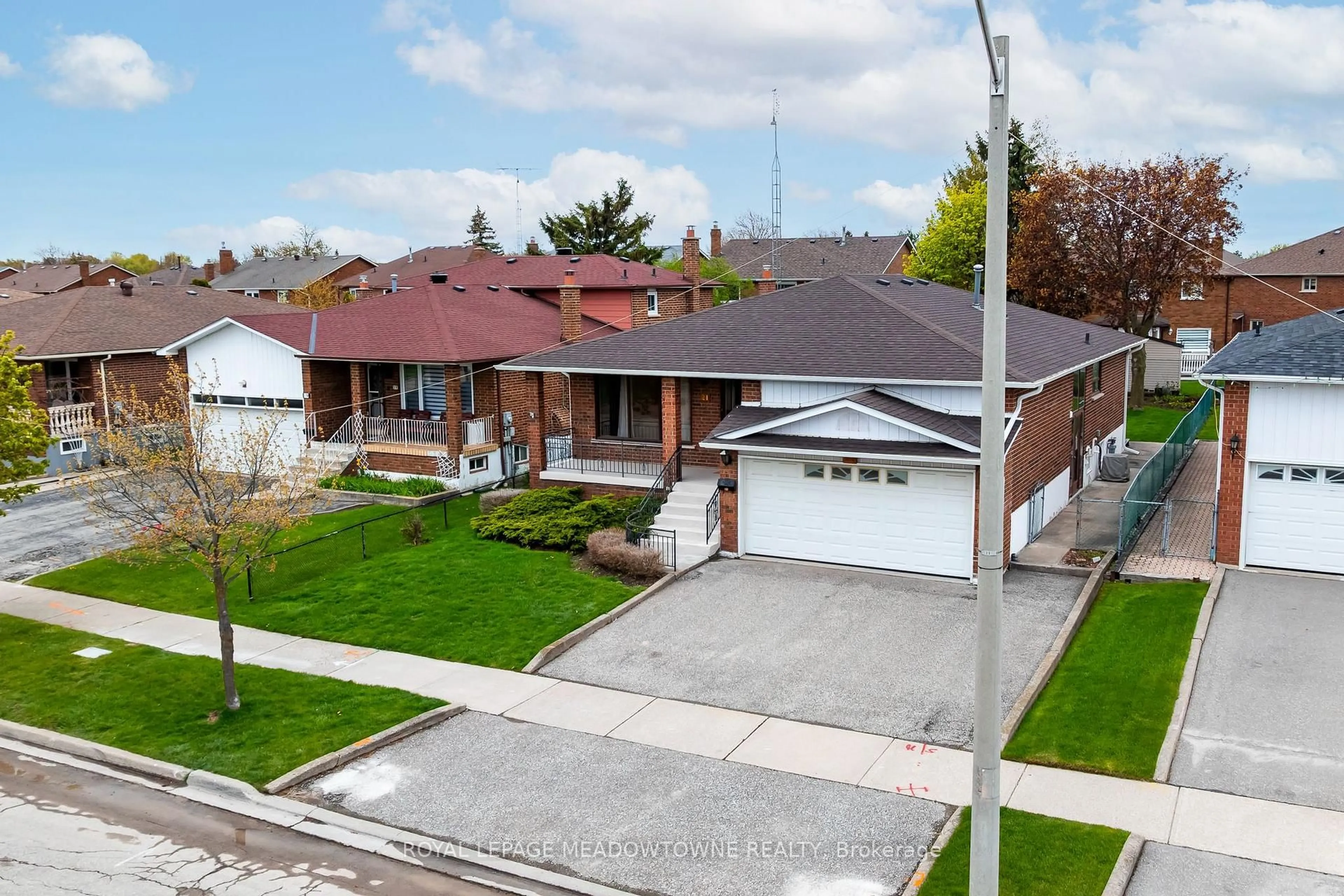 A pic from outside/outdoor area/front of a property/back of a property/a pic from drone, street for 21 Leander St, Brampton Ontario L6S 3M3