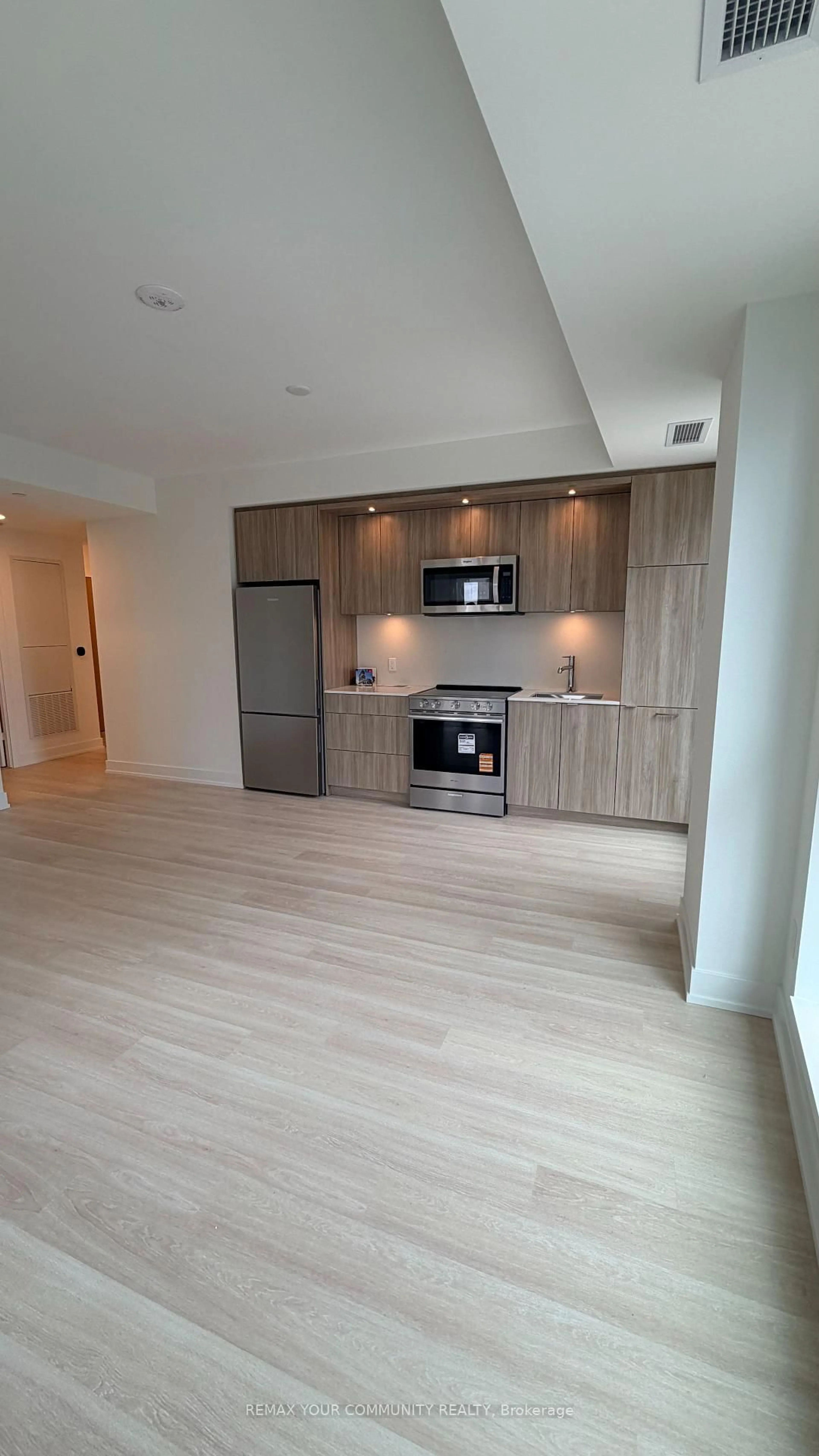 Open concept kitchen, wood/laminate floor for 25 Cordova Ave #8, Toronto Ontario M9A 0E5