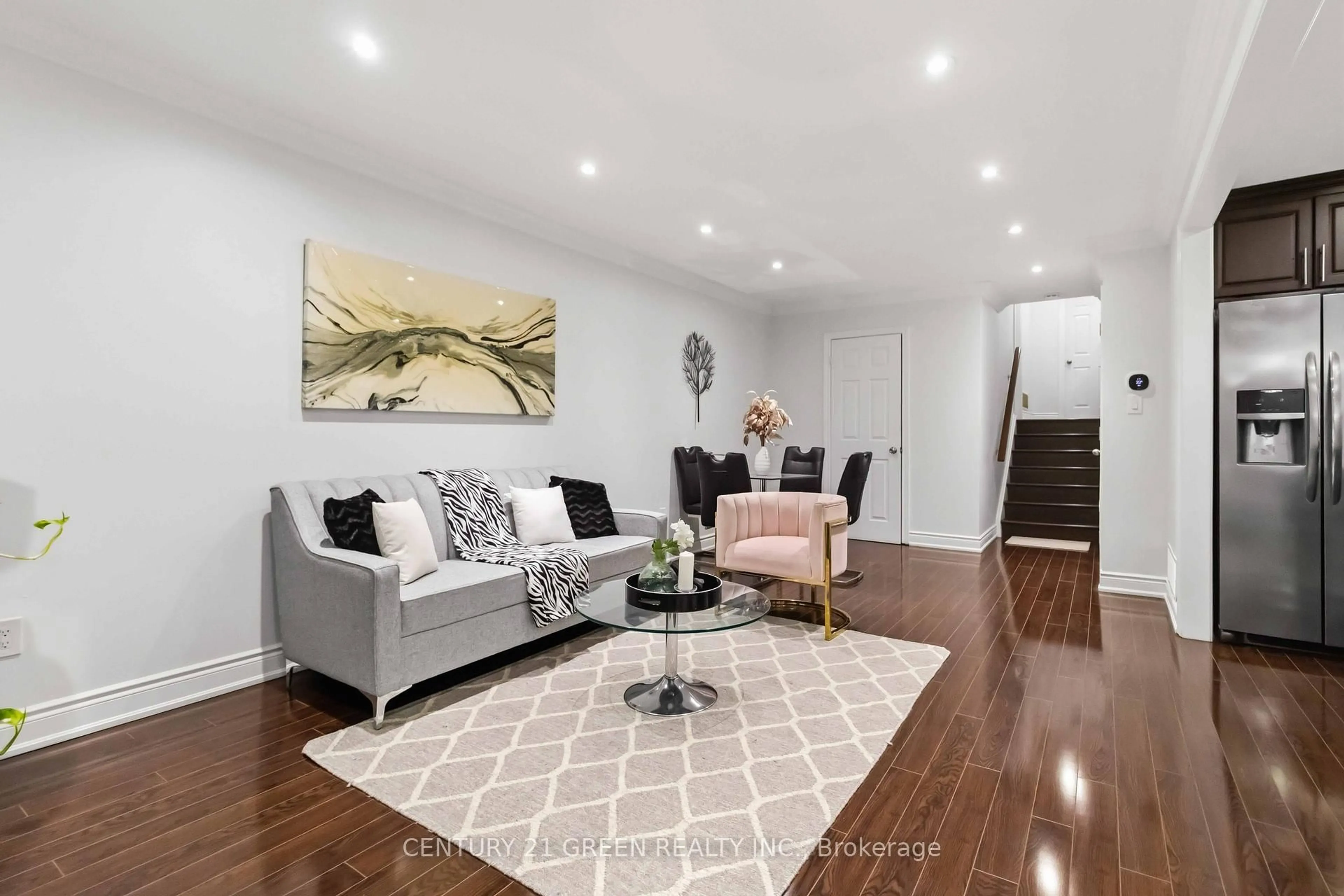 Living room with furniture, wood/laminate floor for 74 Davenport Cres, Brampton Ontario L6T 3L6
