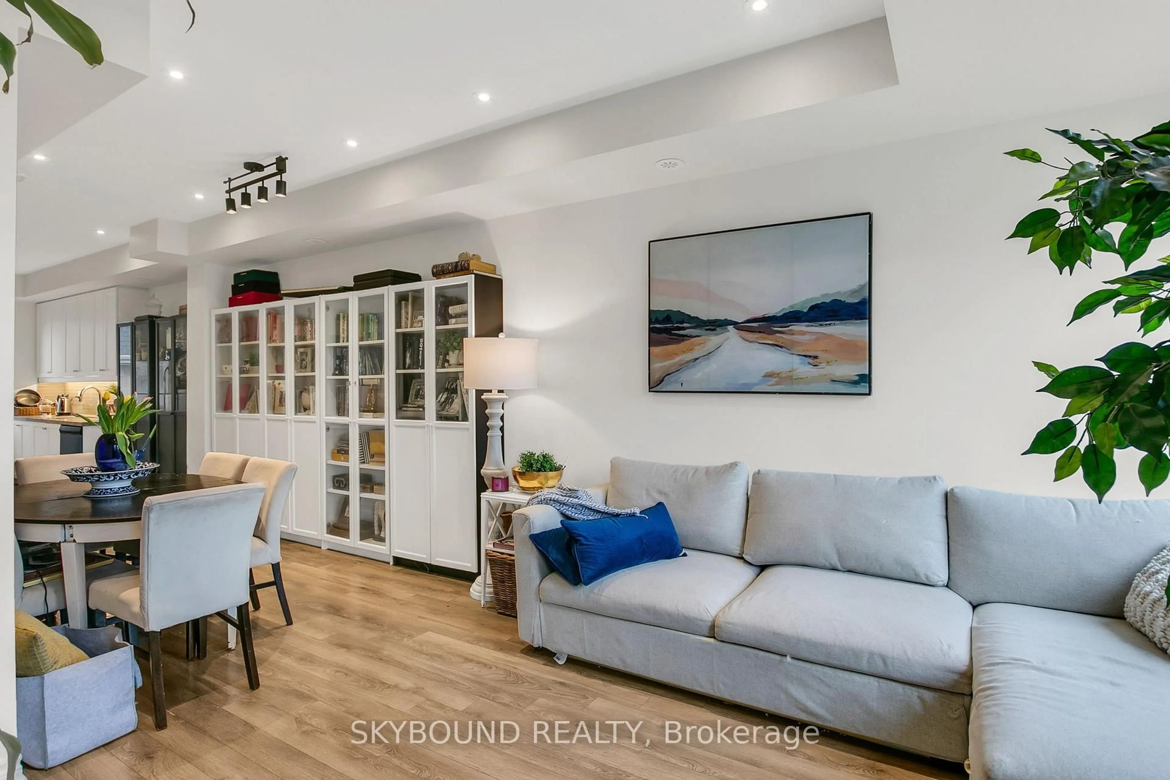 Living room with furniture, wood/laminate floor for 380 Hopewell Ave #223, Toronto Ontario M6E 2S2