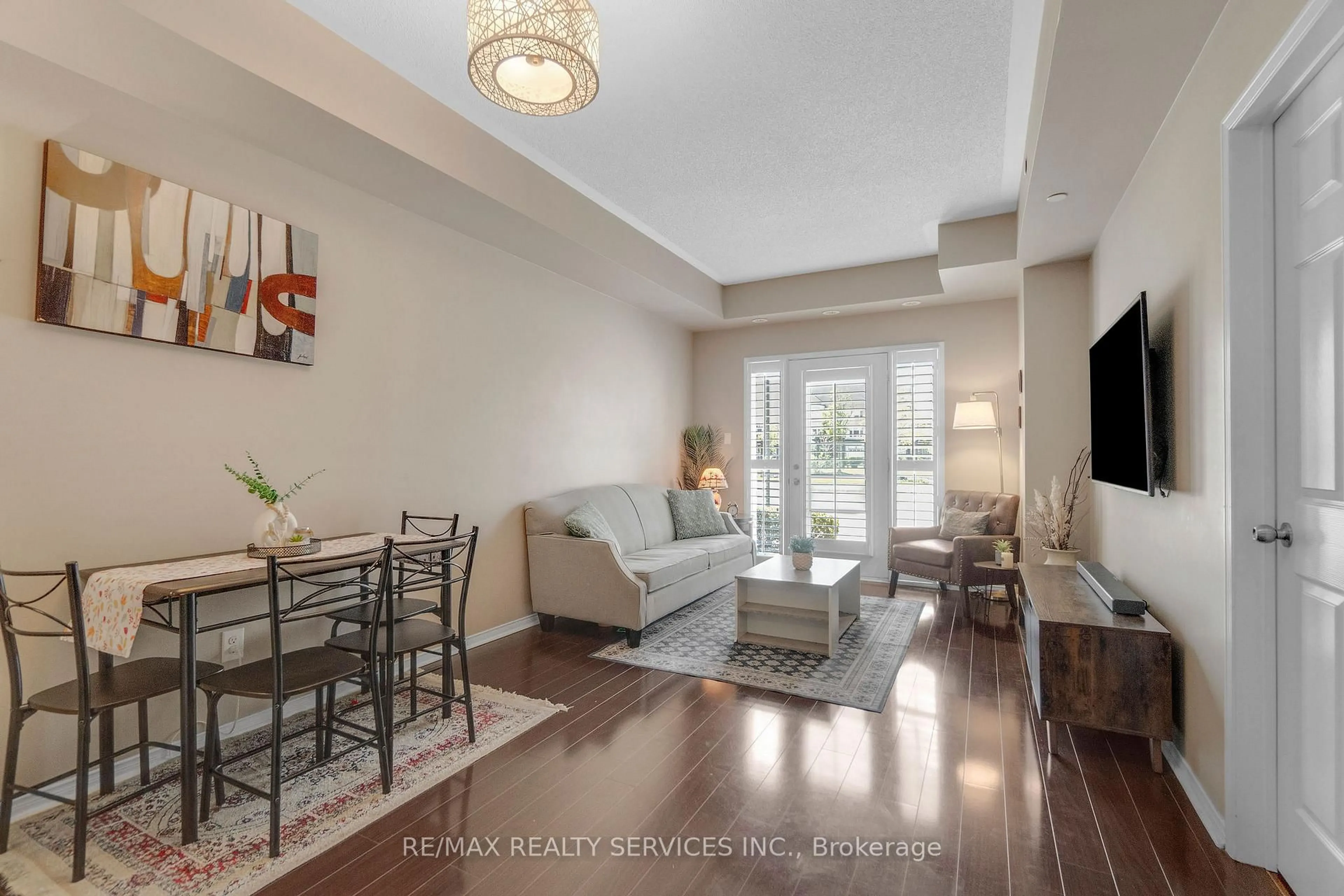 Living room with furniture, unknown for 5150 Winston Churchill Blvd #101, Mississauga Ontario L5M 0P1