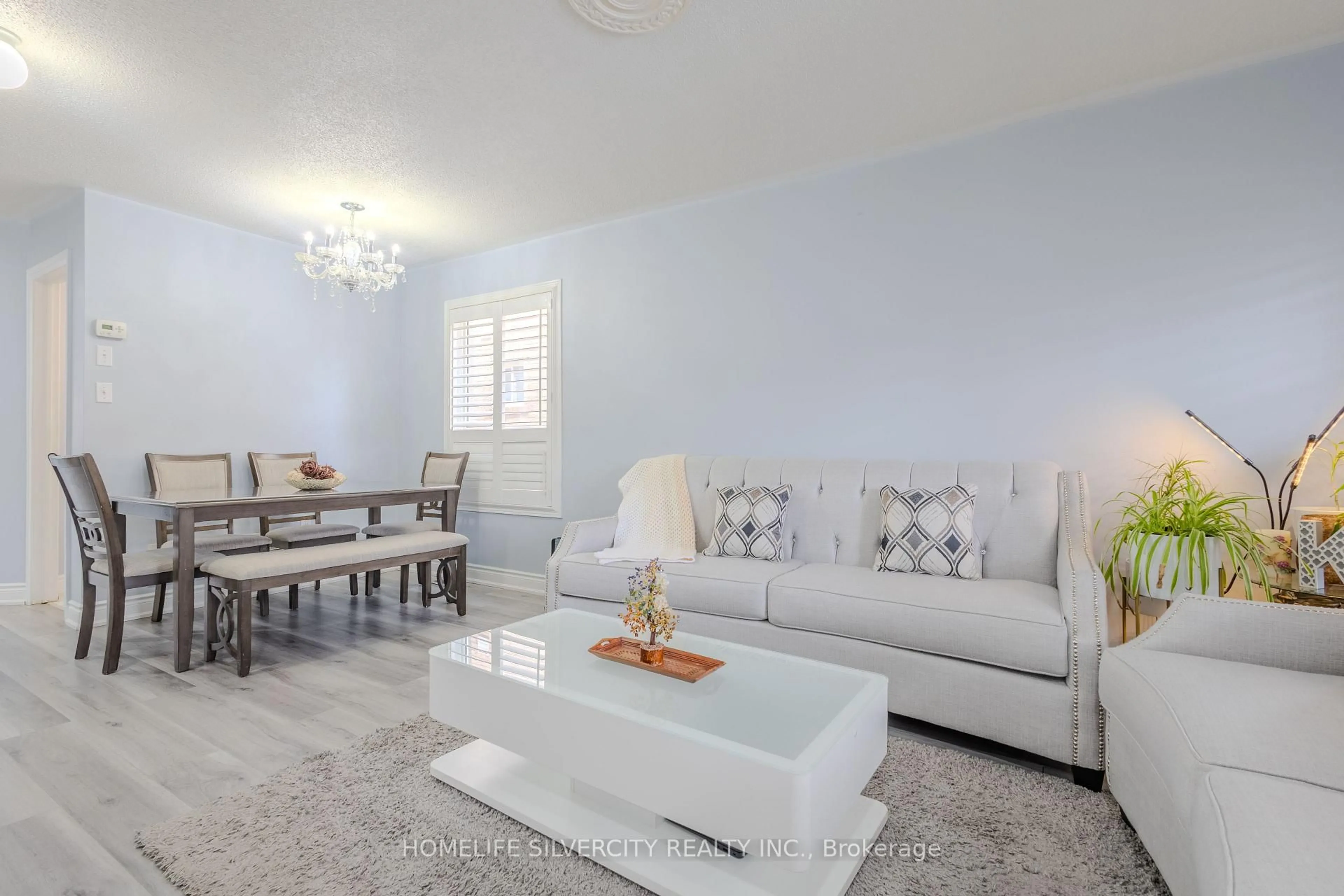 Living room with furniture, unknown for 57 Saintsbury Cres, Brampton Ontario L6R 2V9