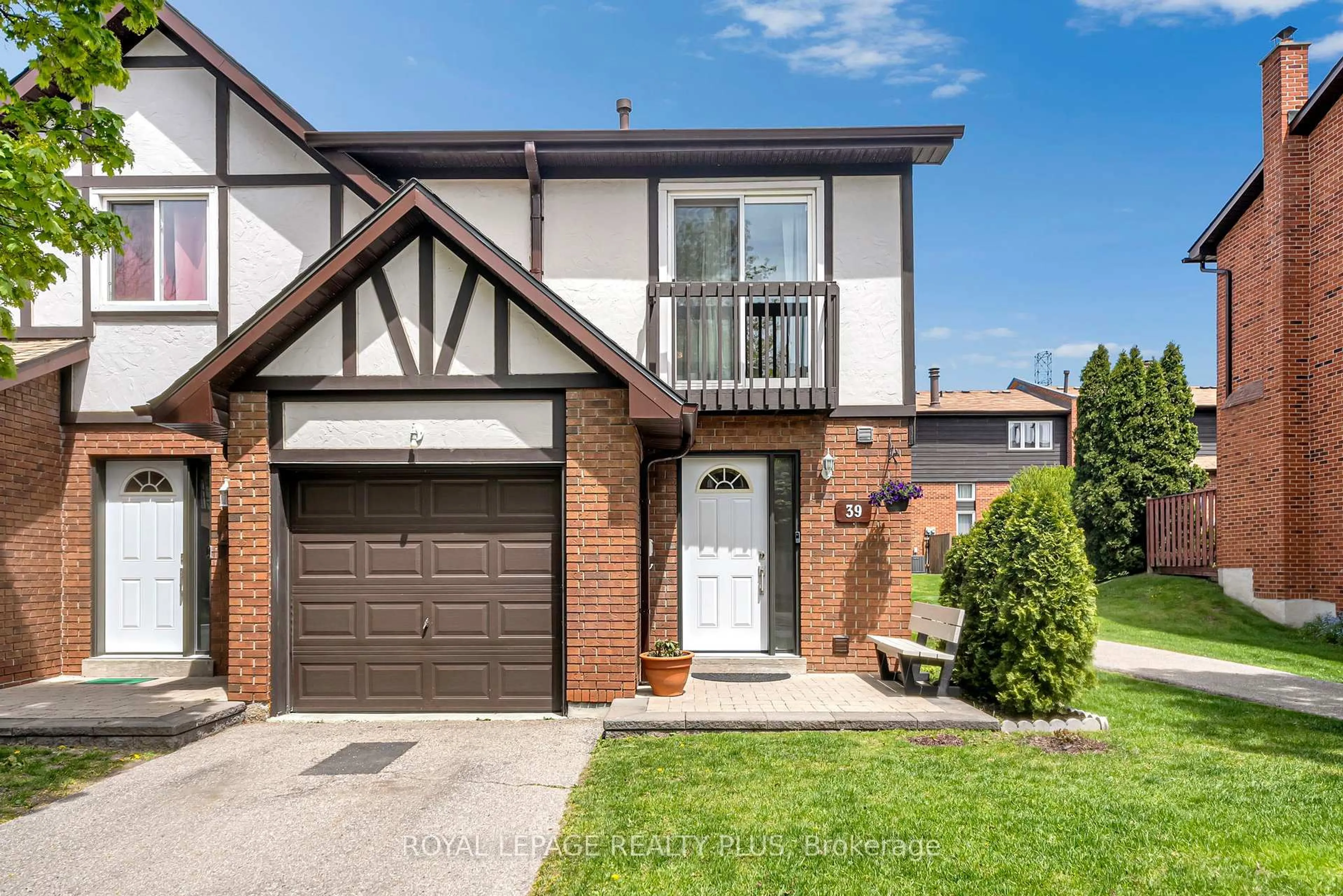 Home with brick exterior material, street for 1755 Rathburn Rd #39, Mississauga Ontario L4W 2M8