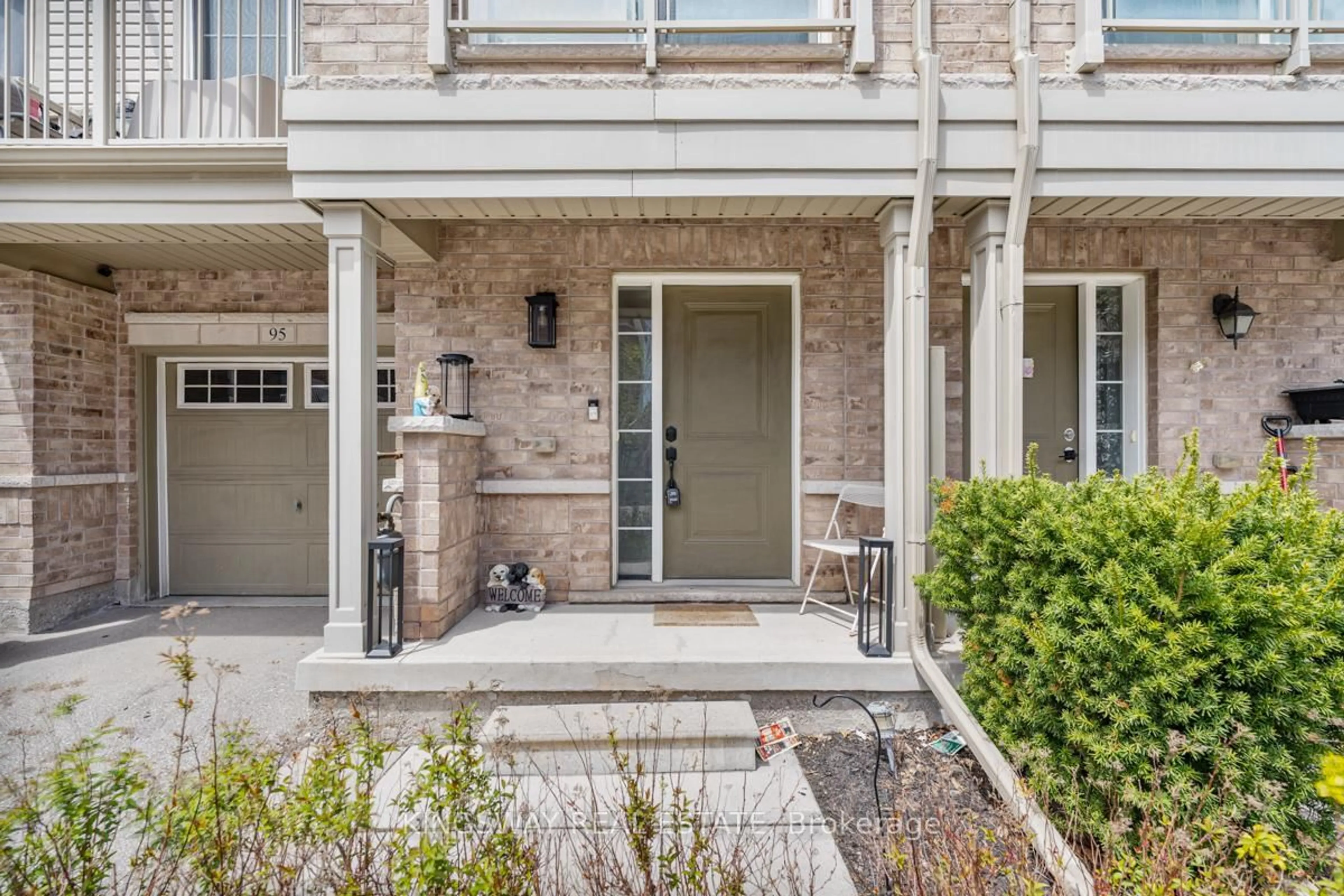 Home with brick exterior material, street for 165 Hampshire Way #95, Milton Ontario L9T 8M7