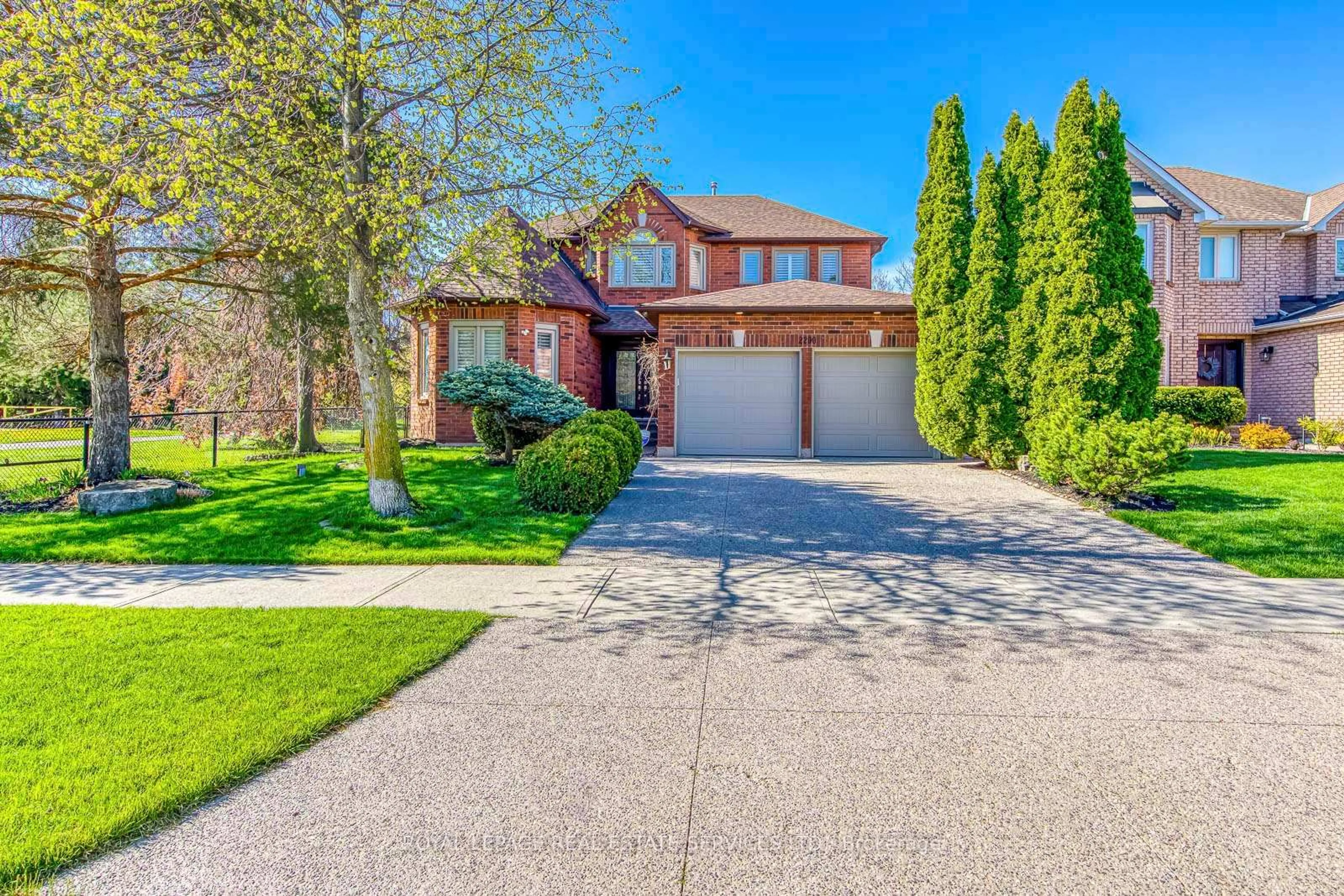 Home with brick exterior material, street for 2200 Brays Lane, Oakville Ontario L6M 3J7