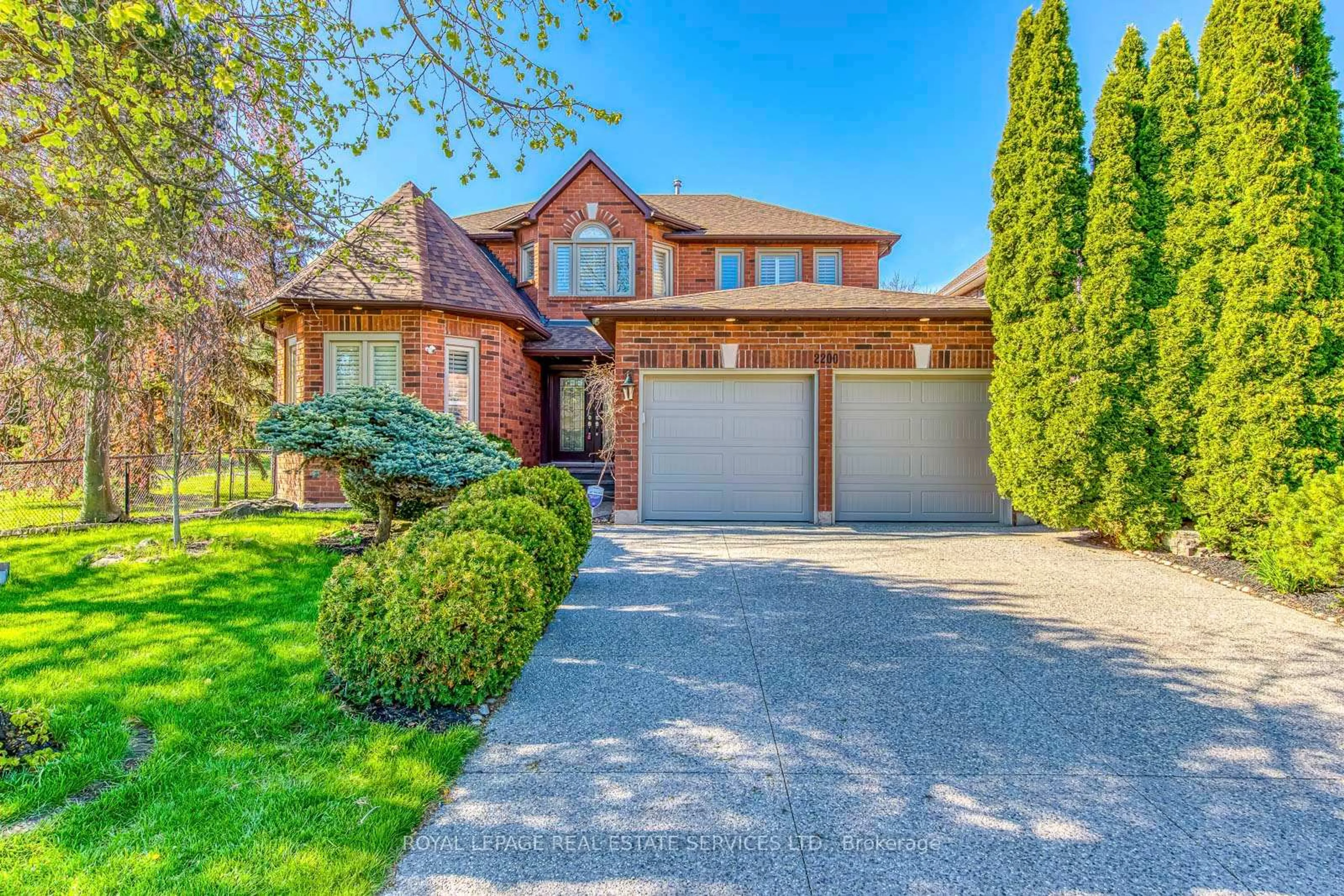 Home with brick exterior material, street for 2200 Brays Lane, Oakville Ontario L6M 3J7