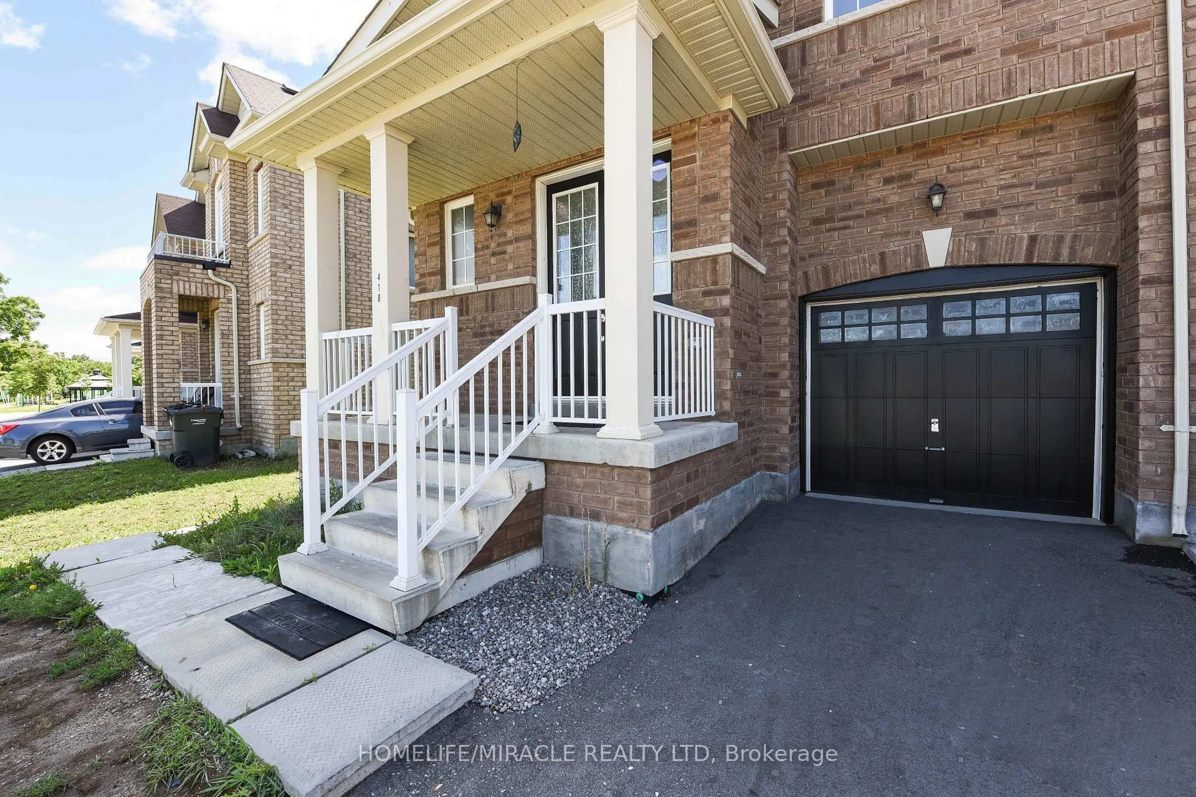 Home with brick exterior material, street for 418 Royal West Dr, Brampton Ontario L6X 5K1