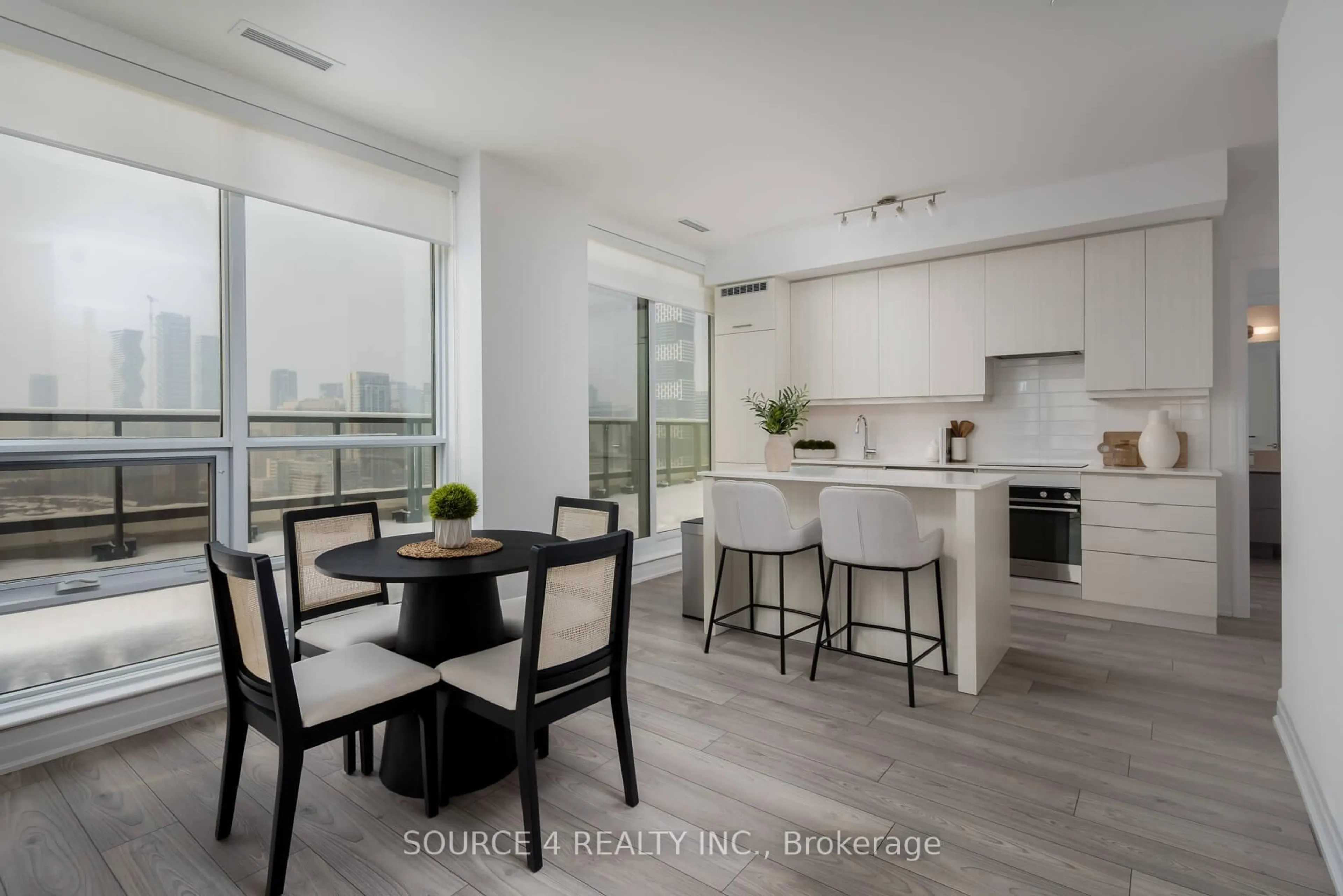 Open concept kitchen, wood/laminate floor for 36 Elm Dr #2708, Mississauga Ontario L5B 0N3