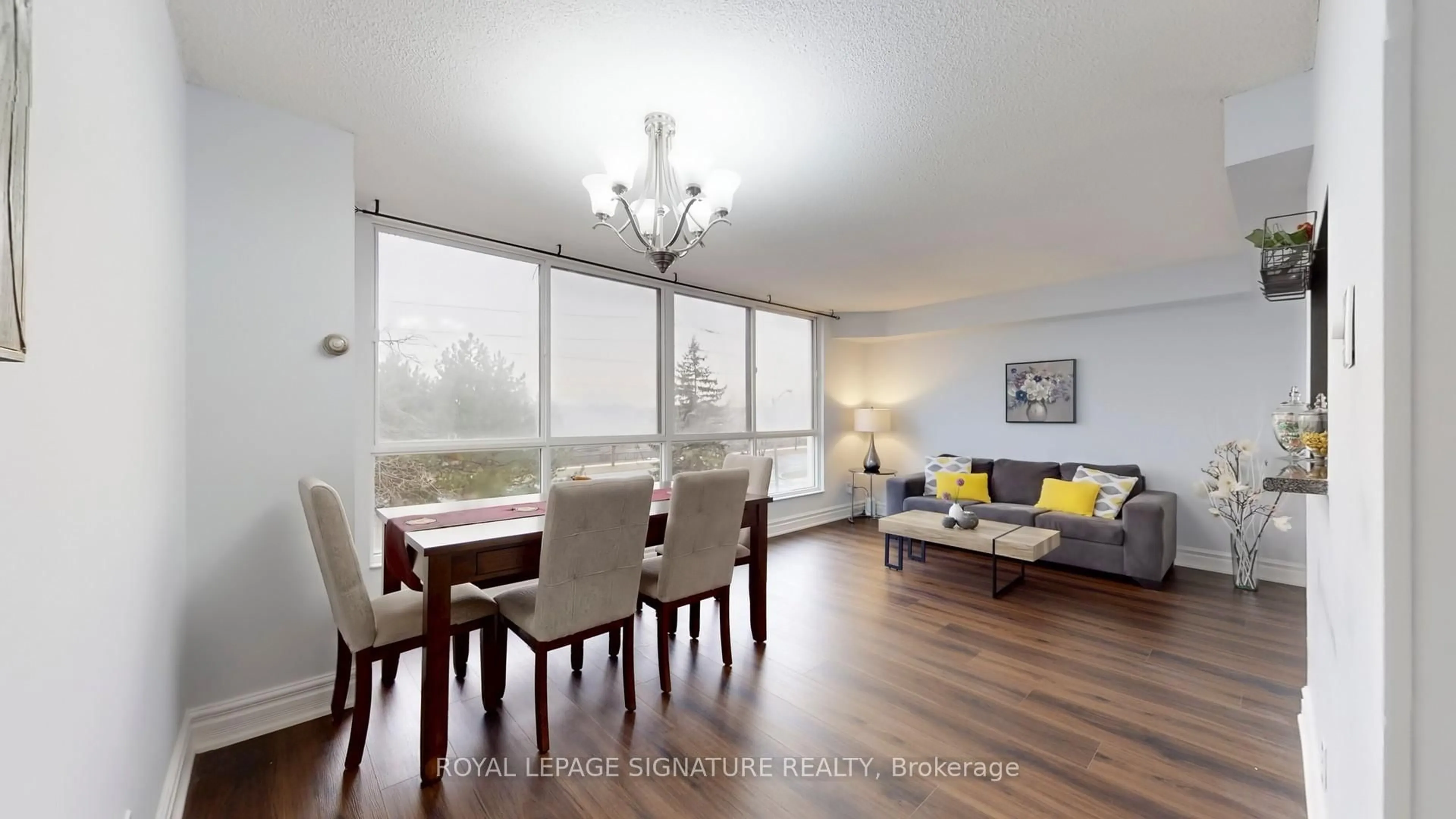 Living room with furniture, wood/laminate floor for 2901 Kipling Ave #307, Toronto Ontario M9V 5E5