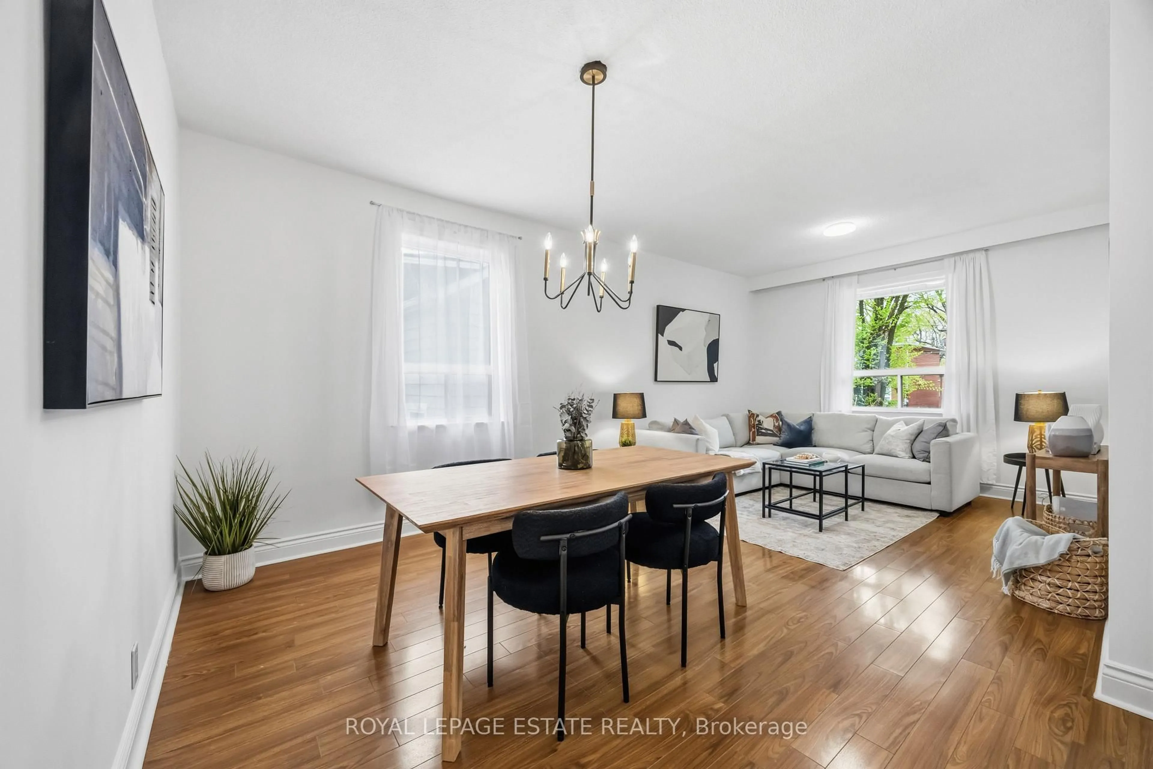Dining room, wood/laminate floor for 293 Harvie Ave, Toronto Ontario M6E 4L2