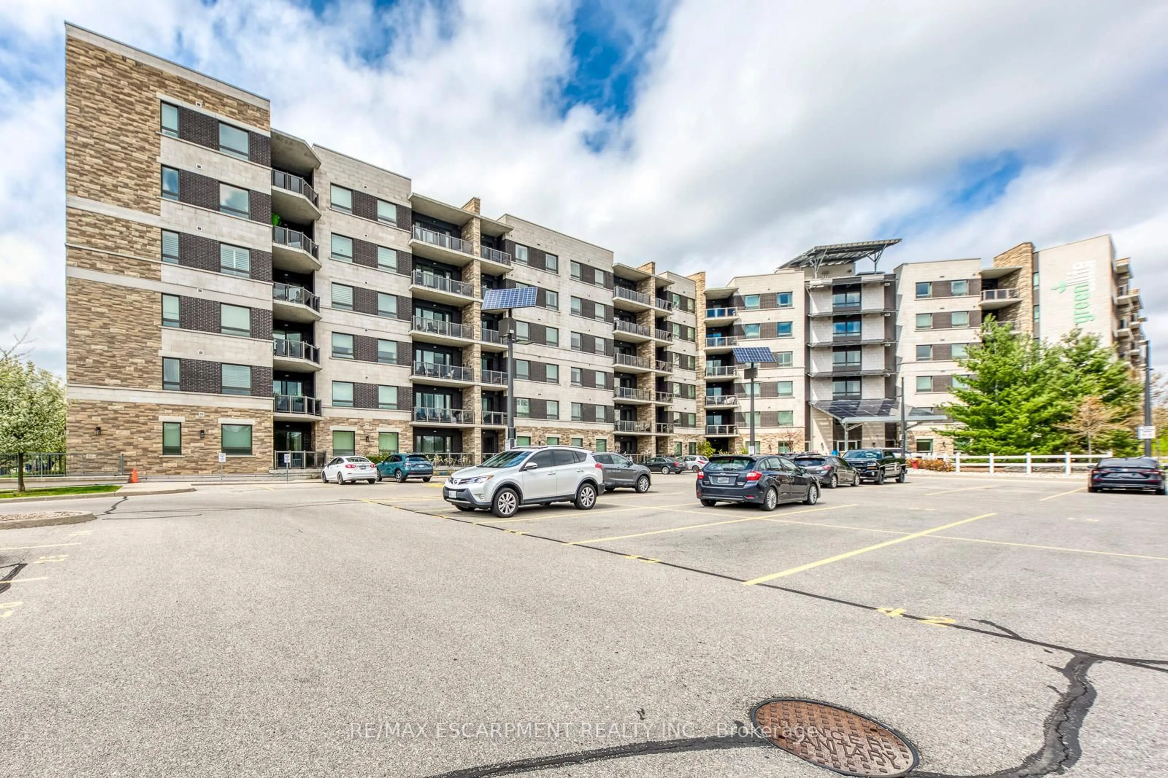 A pic from outside/outdoor area/front of a property/back of a property/a pic from drone, street for 33 WHITMER St #217, Milton Ontario L9T 8P9