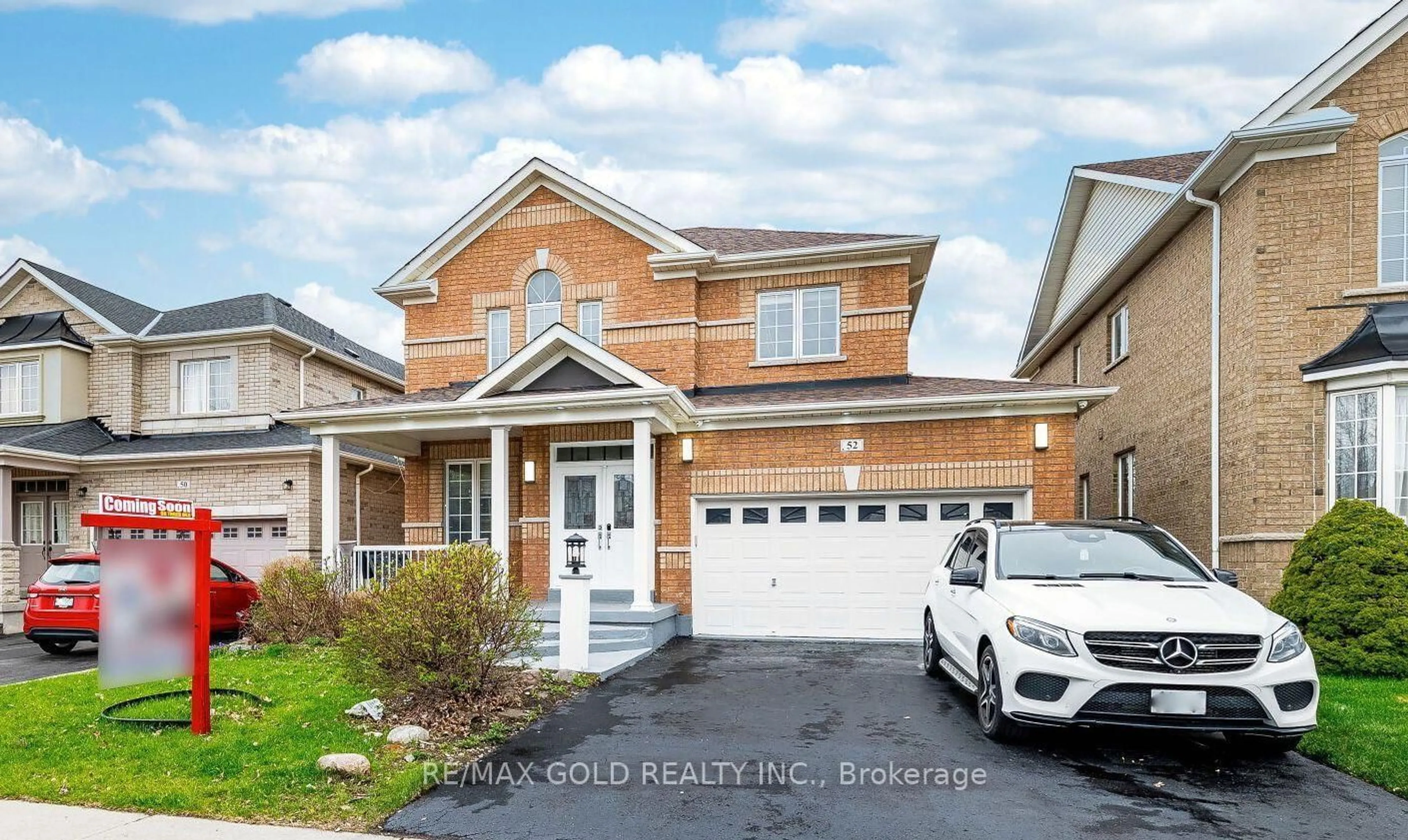 Home with brick exterior material, street for 52 Moldovan Dr, Brampton Ontario L6R 0E4