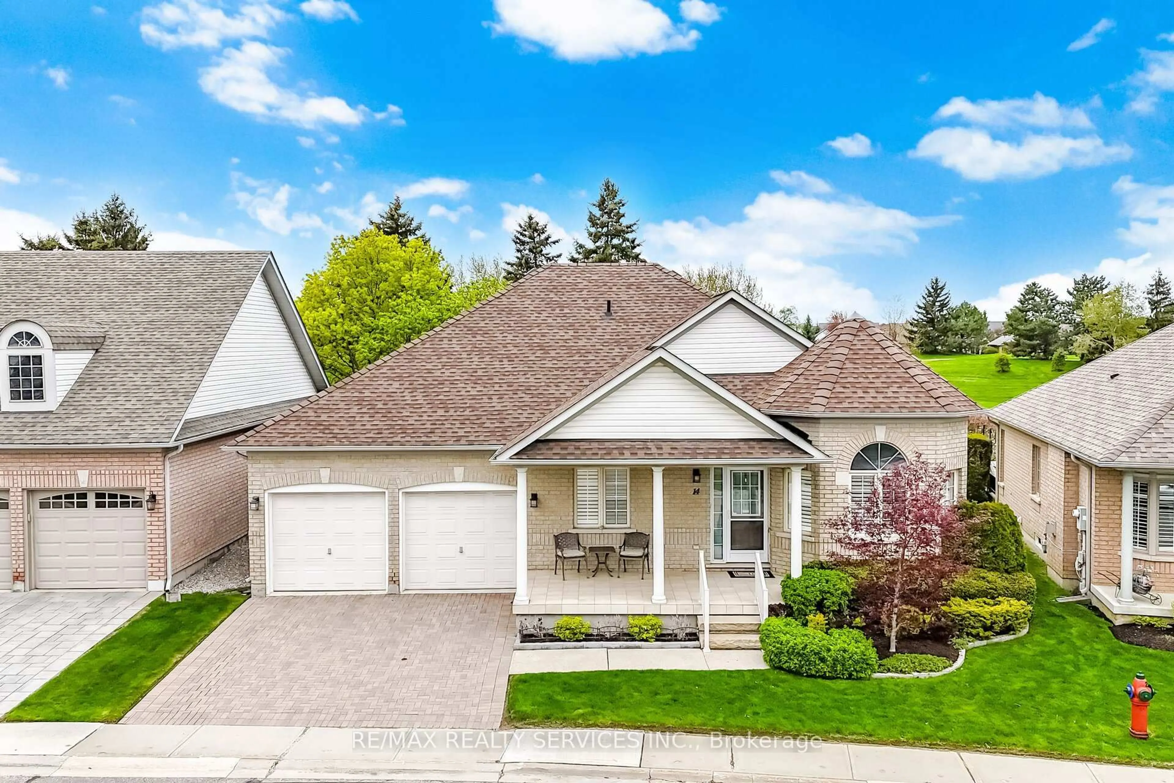 Home with vinyl exterior material, street for 14 Yorkwood Tr, Brampton Ontario L6R 3J3